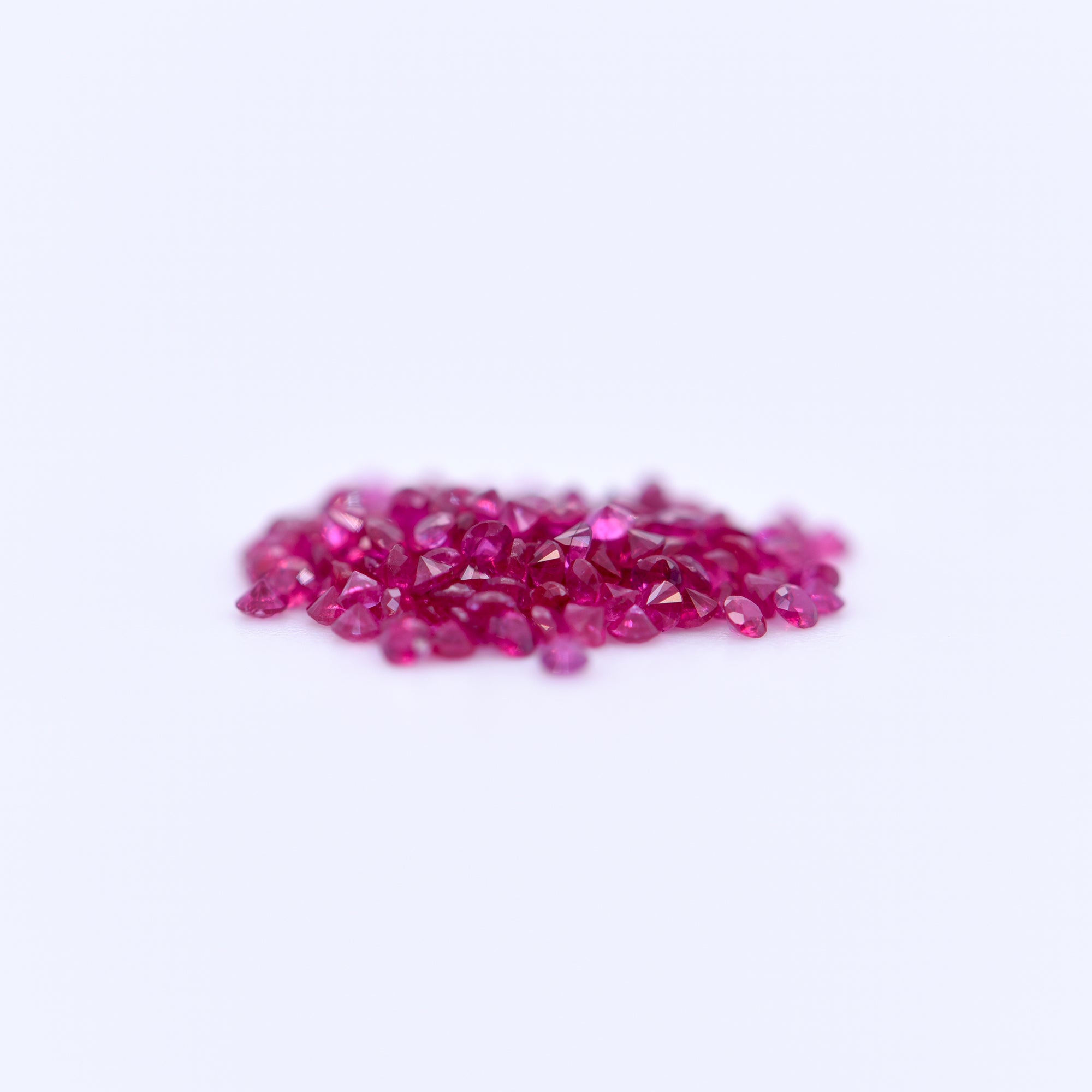 1mm Round Diamond Cut Pink Rubies