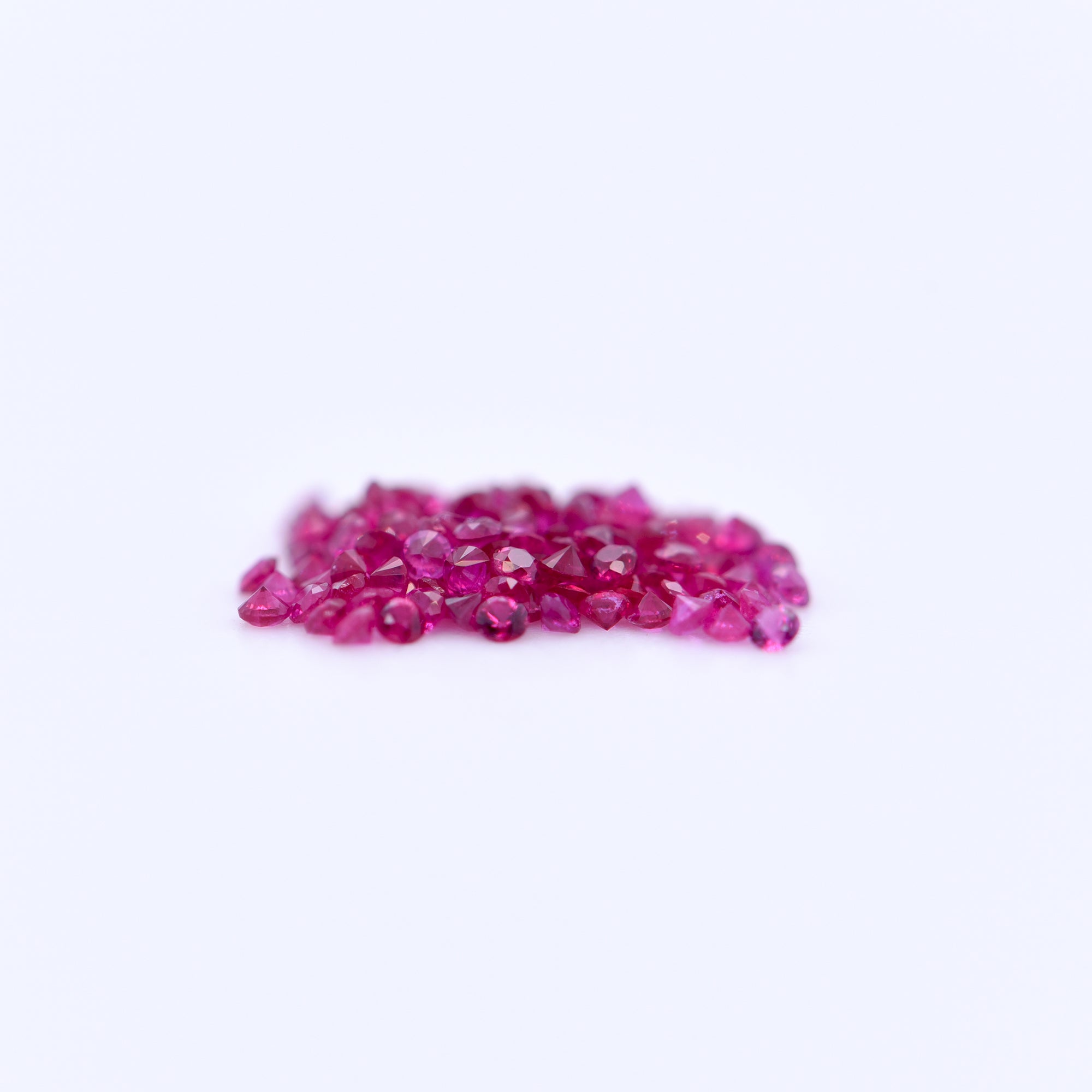 1mm Round Diamond Cut Pink Rubies