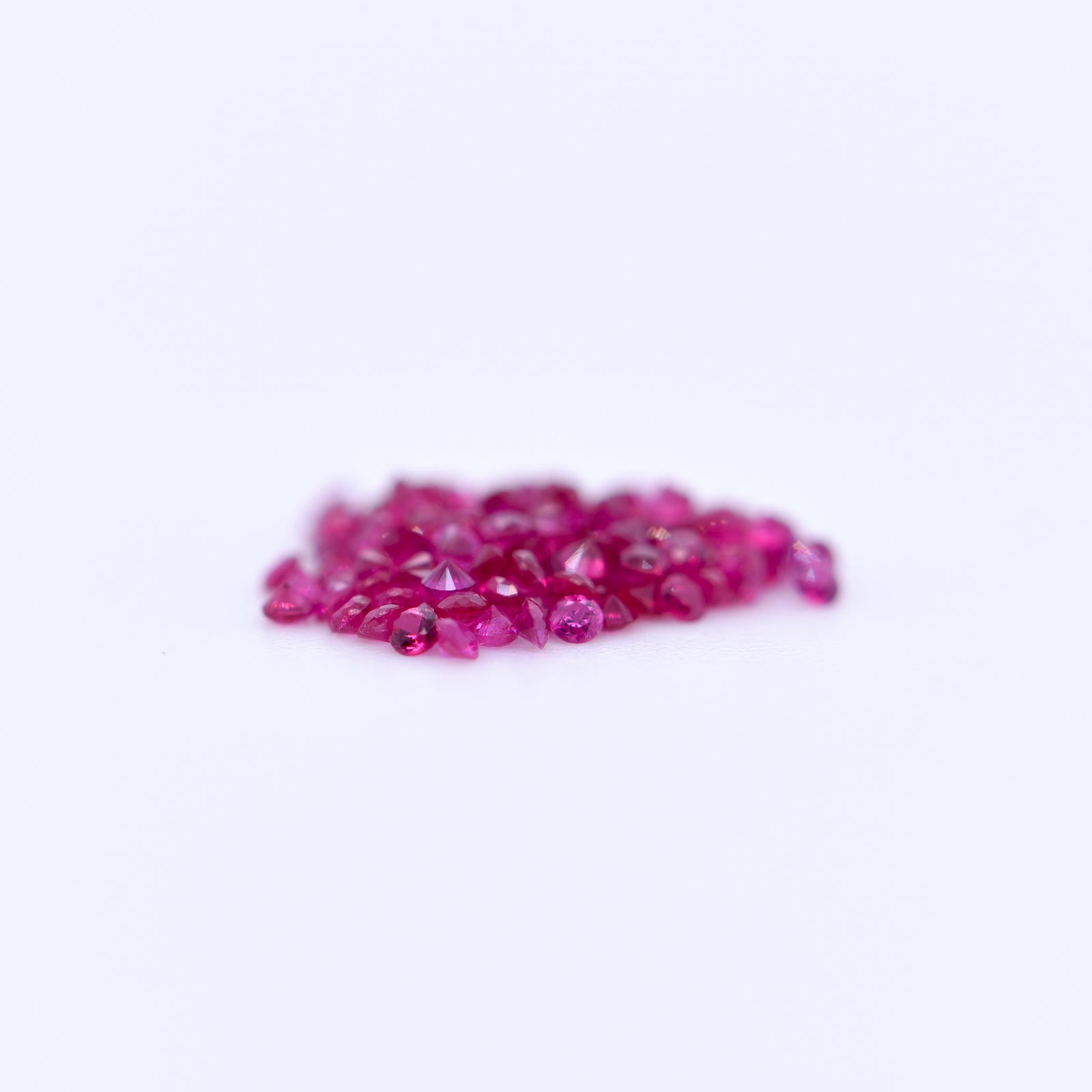 1mm Round Diamond Cut Pink Rubies