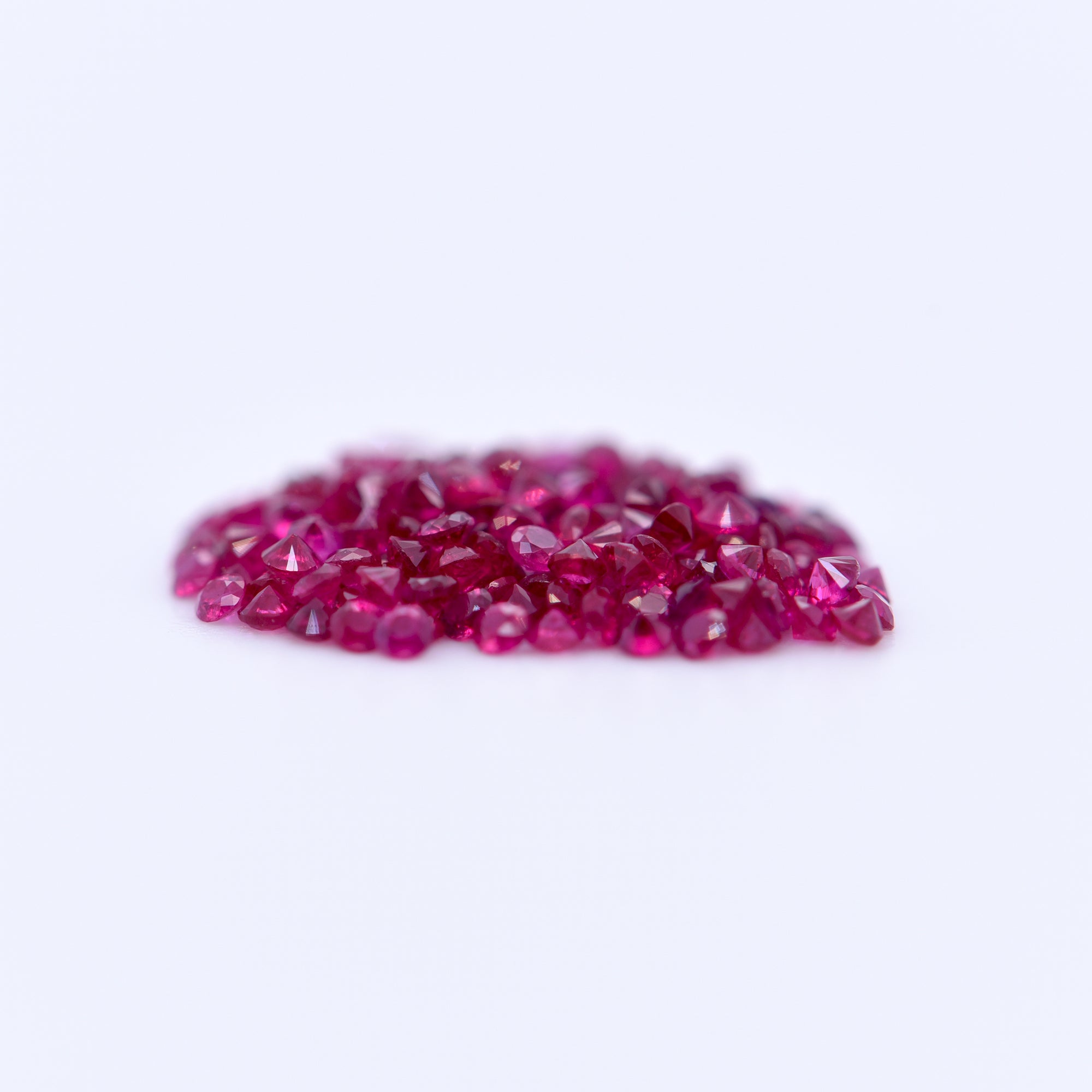 1.25mm Round Diamond Cut Red Rubies