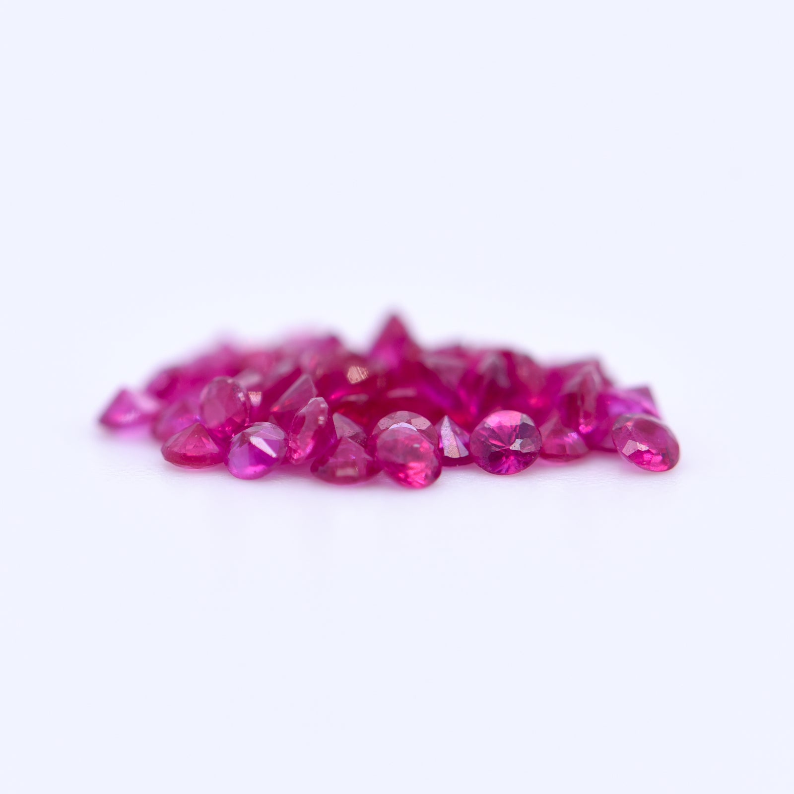 1.75mm Round Diamond Cut Pink Rubies