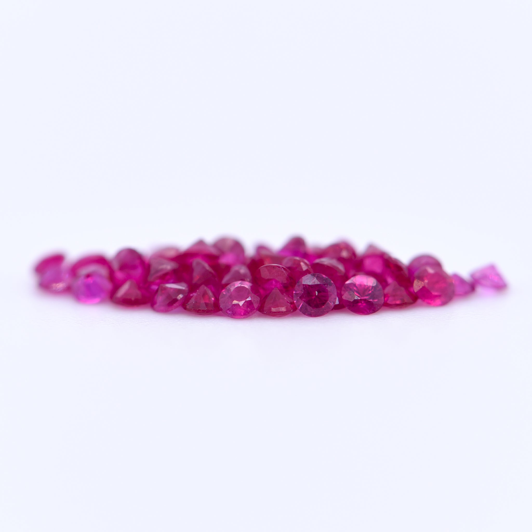 1.75mm Round Diamond Cut Pink Rubies