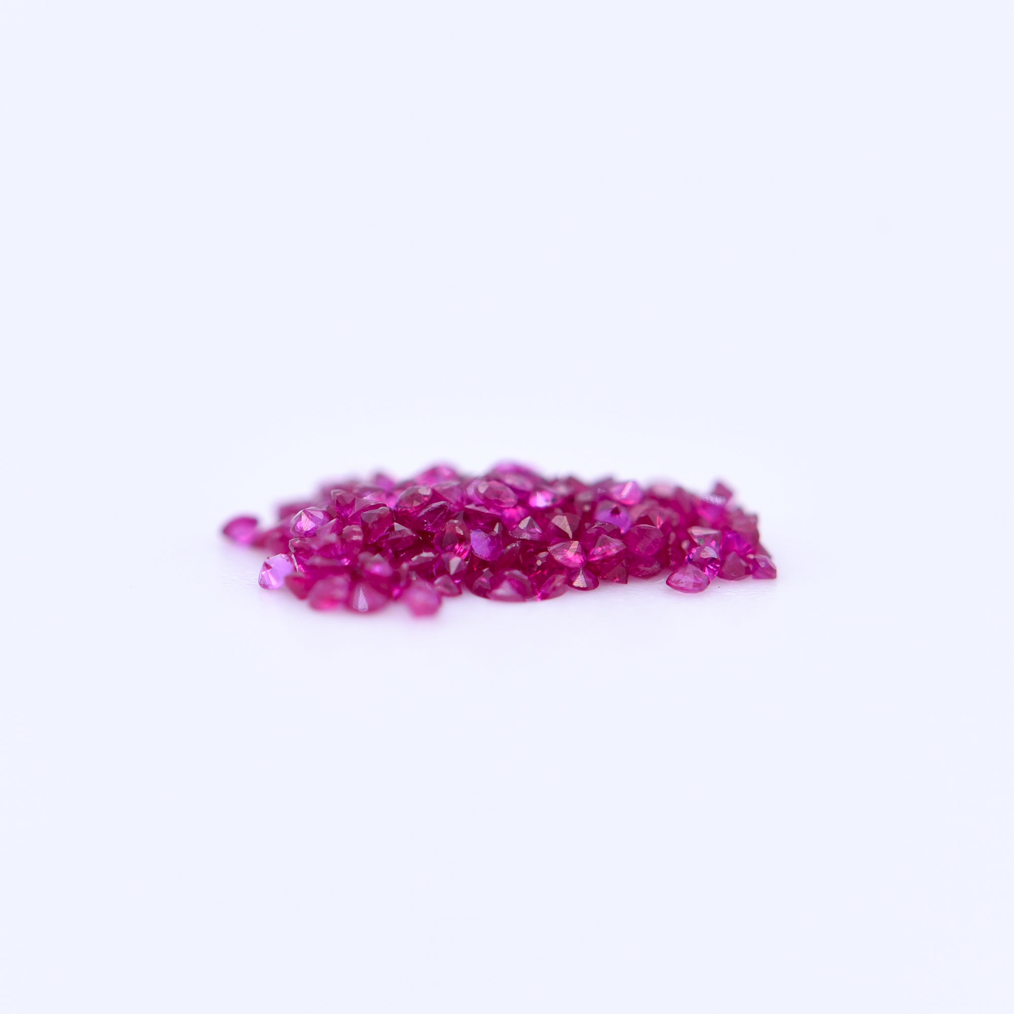 1mm Round Diamond Cut Pink Rubies