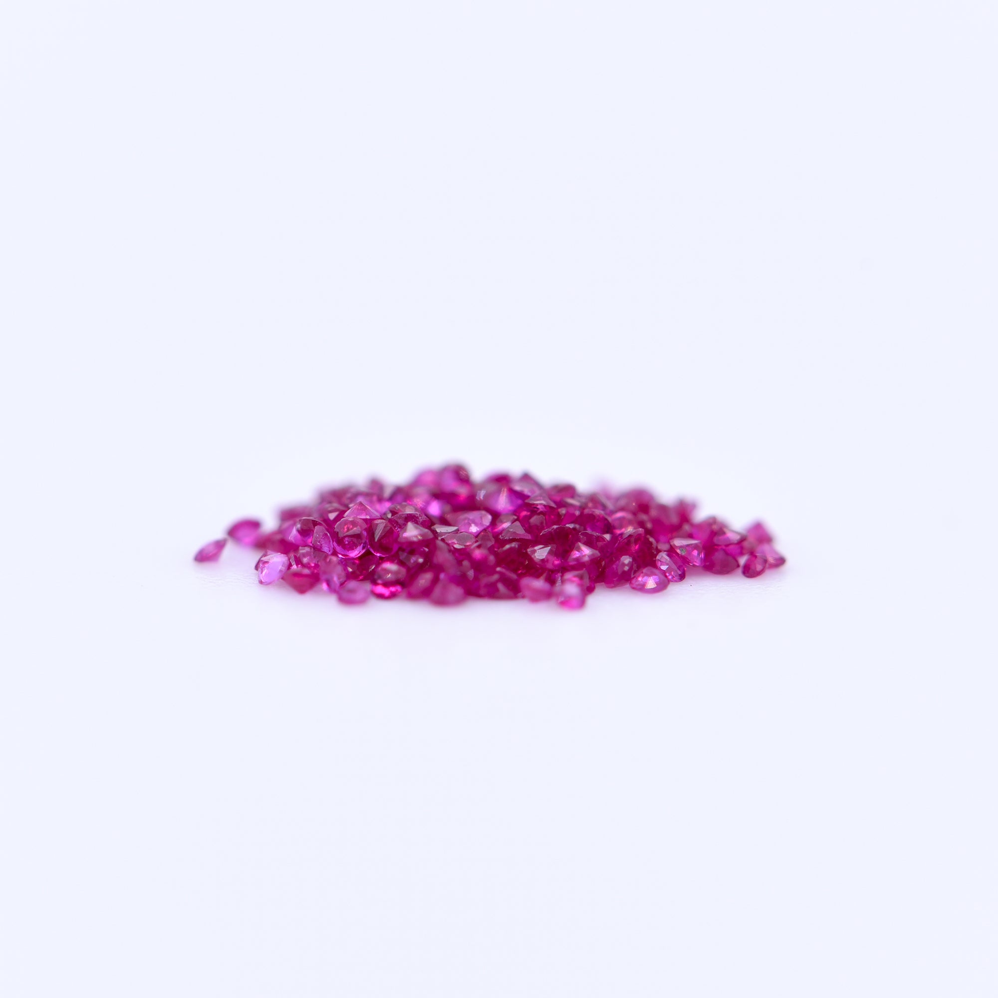 1mm Round Diamond Cut Pink Rubies