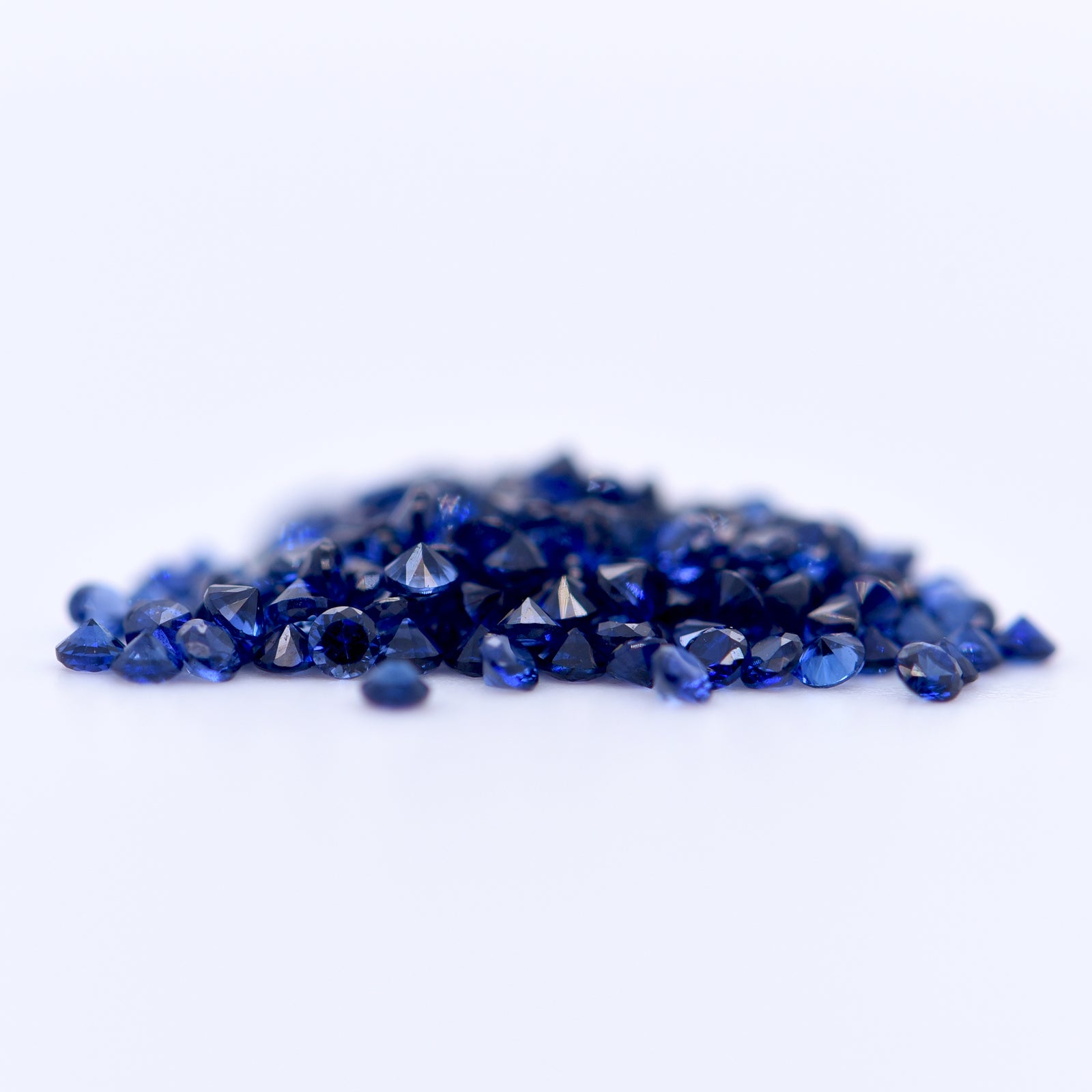 1.5mm Round Diamond Cut Blue Sapphires