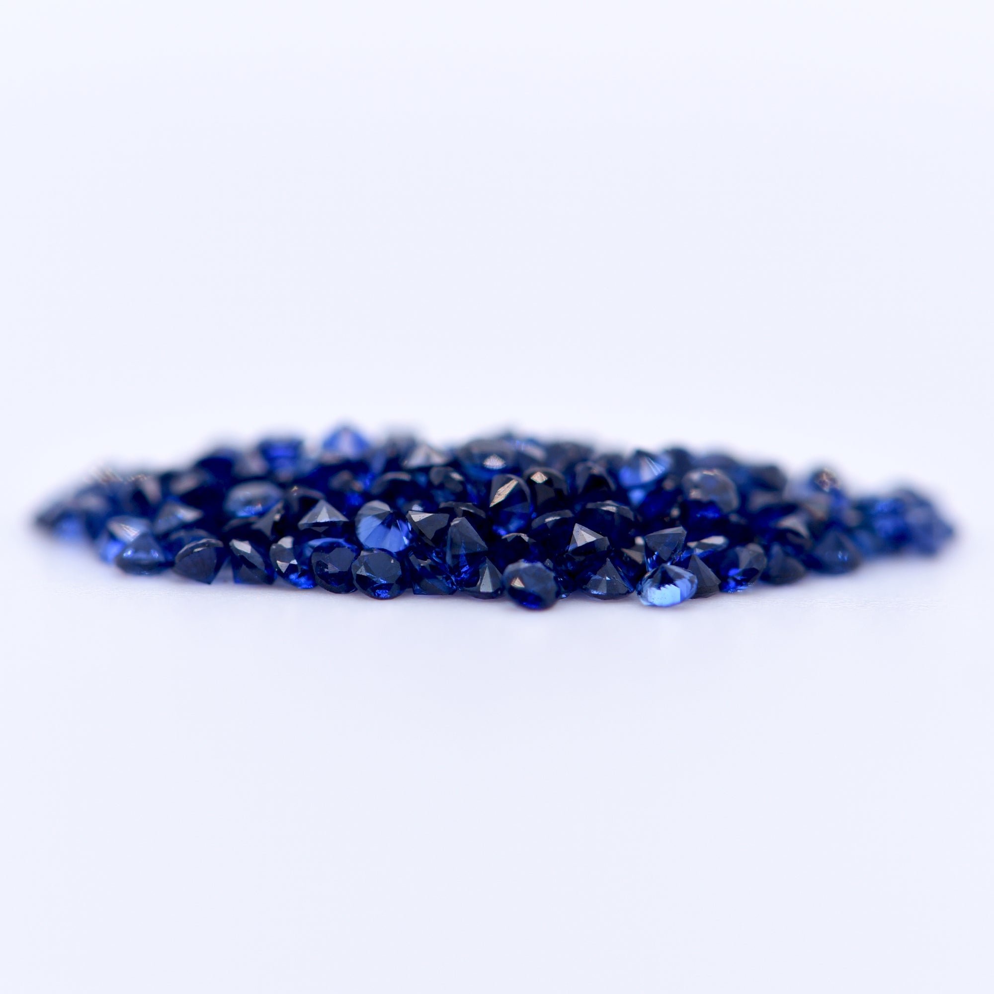 1.5mm Round Diamond Cut Blue Sapphires