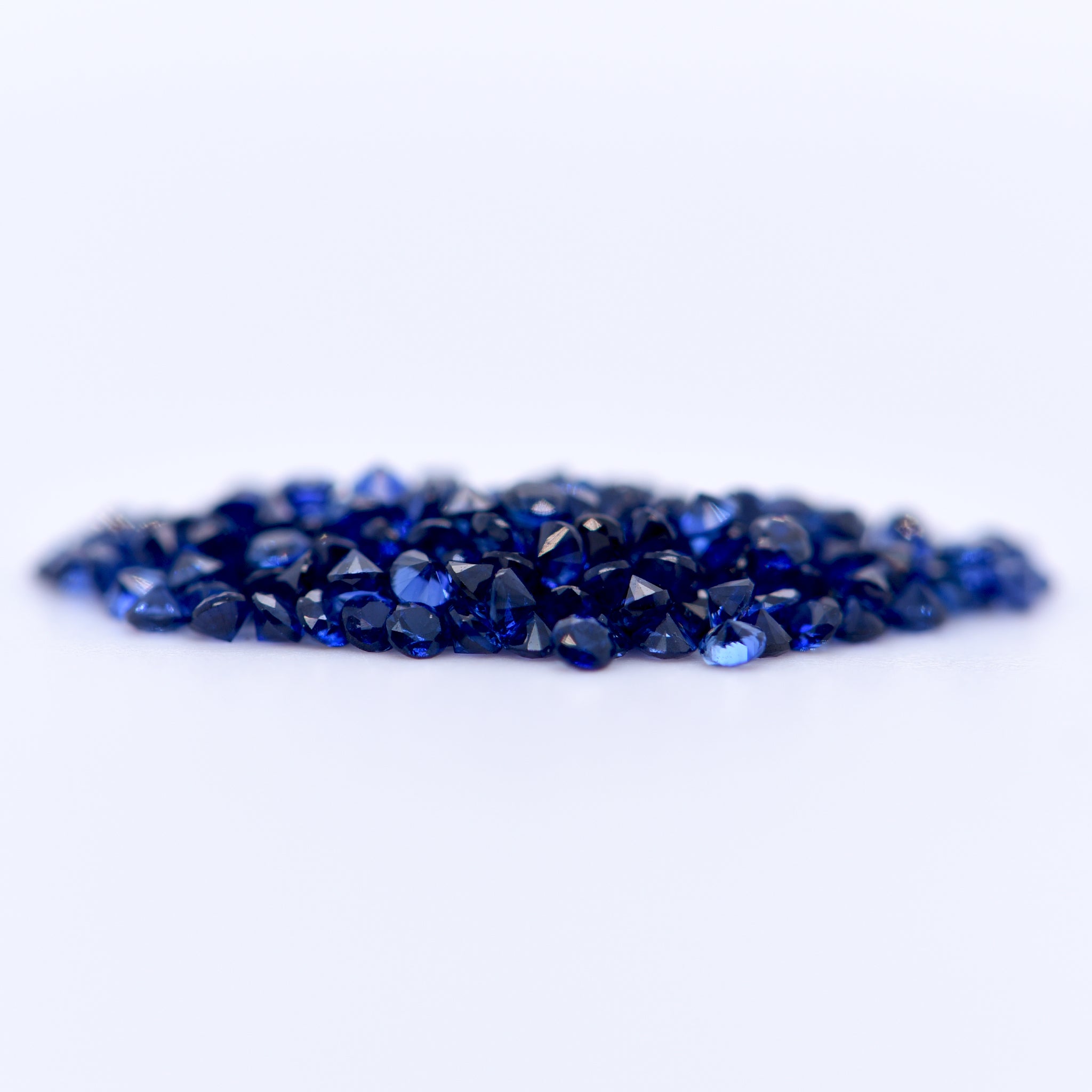 1.5mm Round Diamond Cut Blue Sapphires