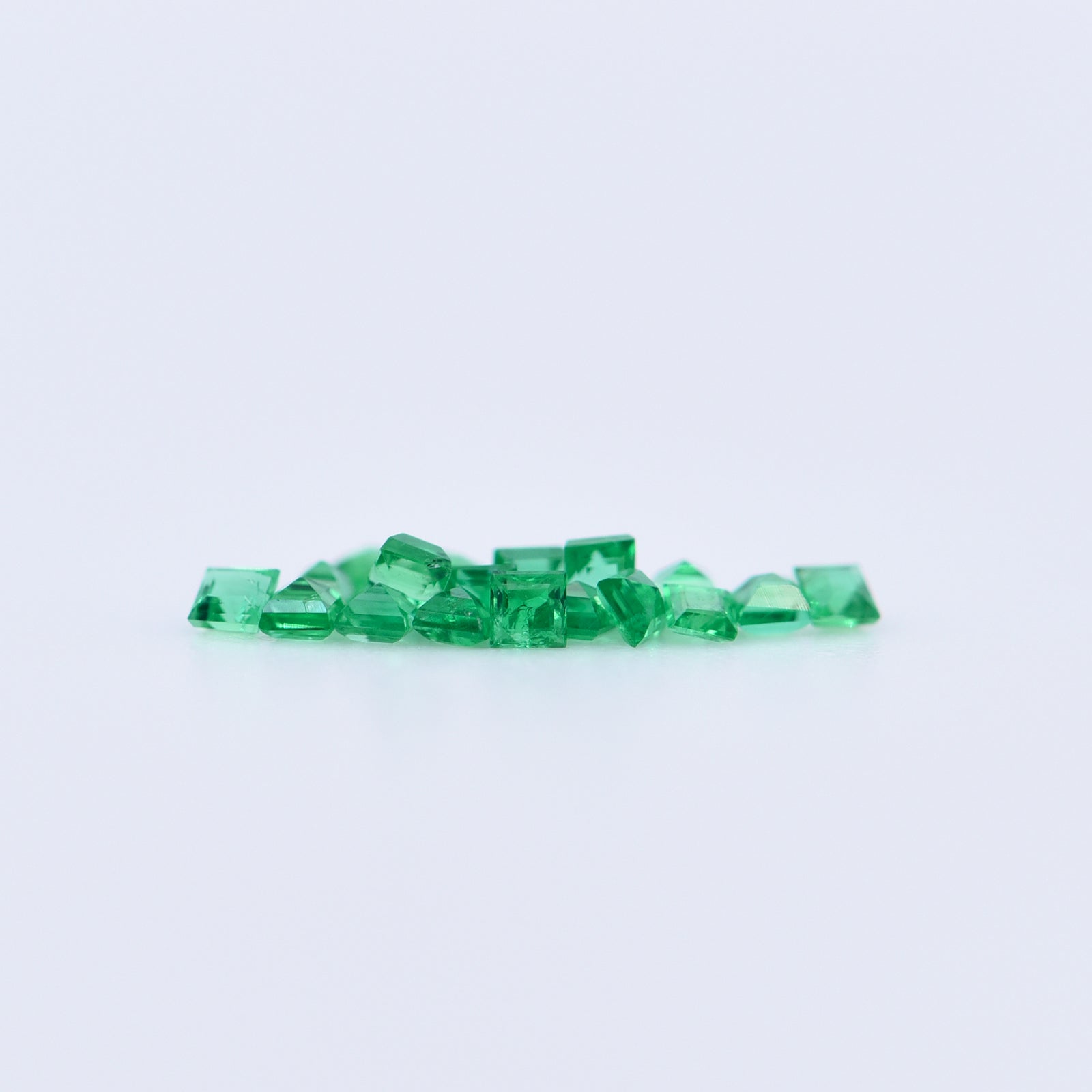 1.25x1.25 Square Step Cut Emeralds