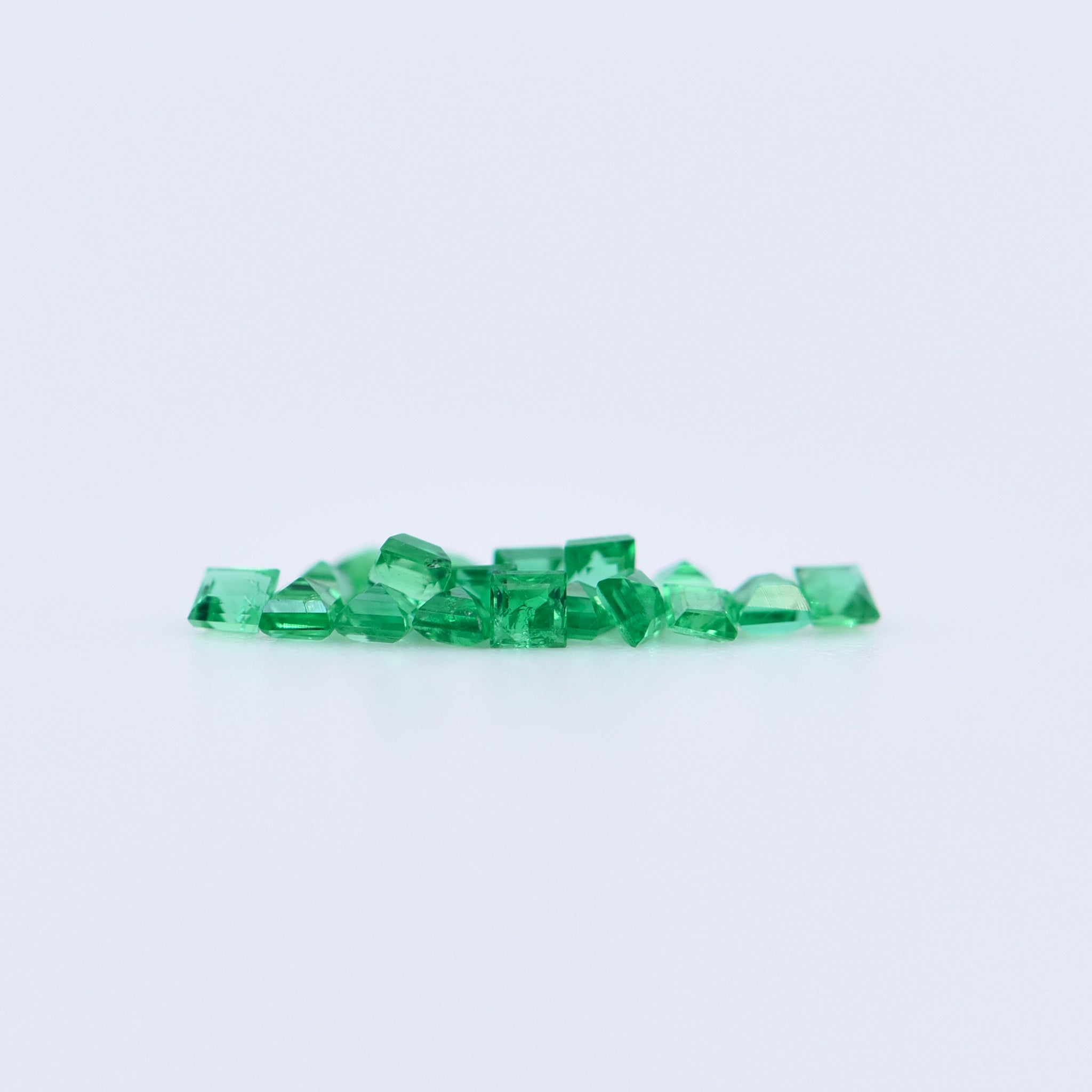 1.25x1.25 Square Step Cut Emeralds