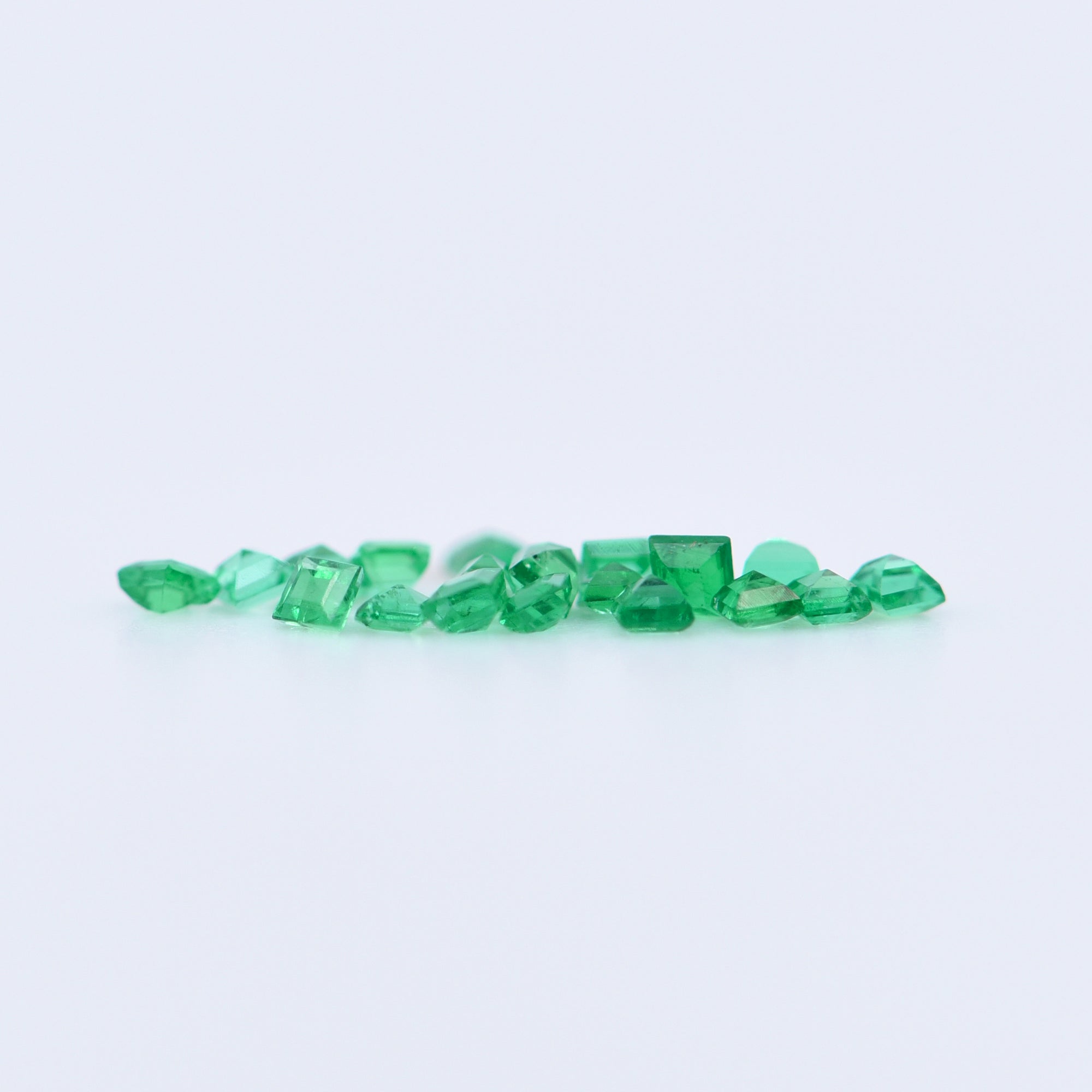 1.25x1.25 Square Step Cut Emeralds