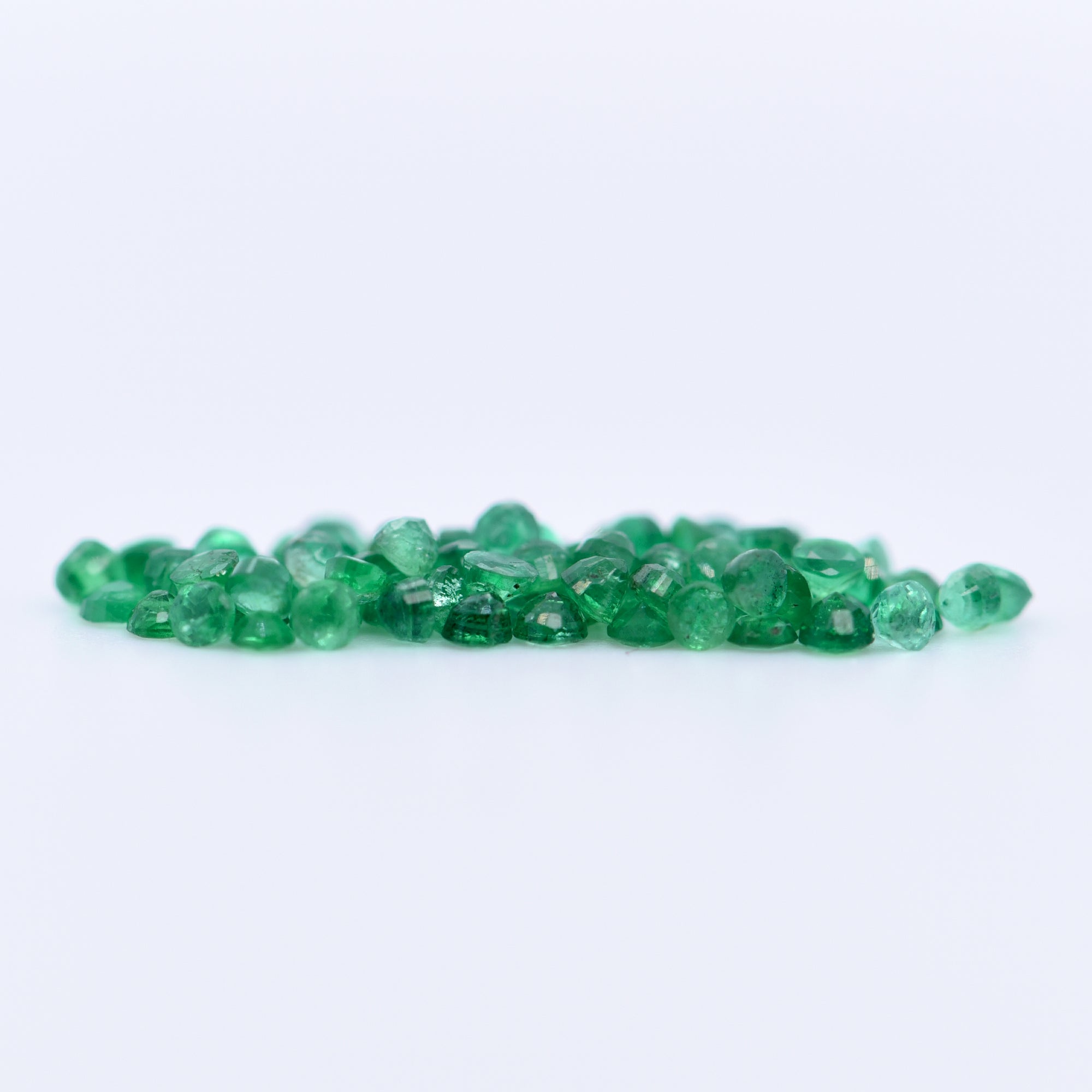 1.5mm Round Faceted Emeralds