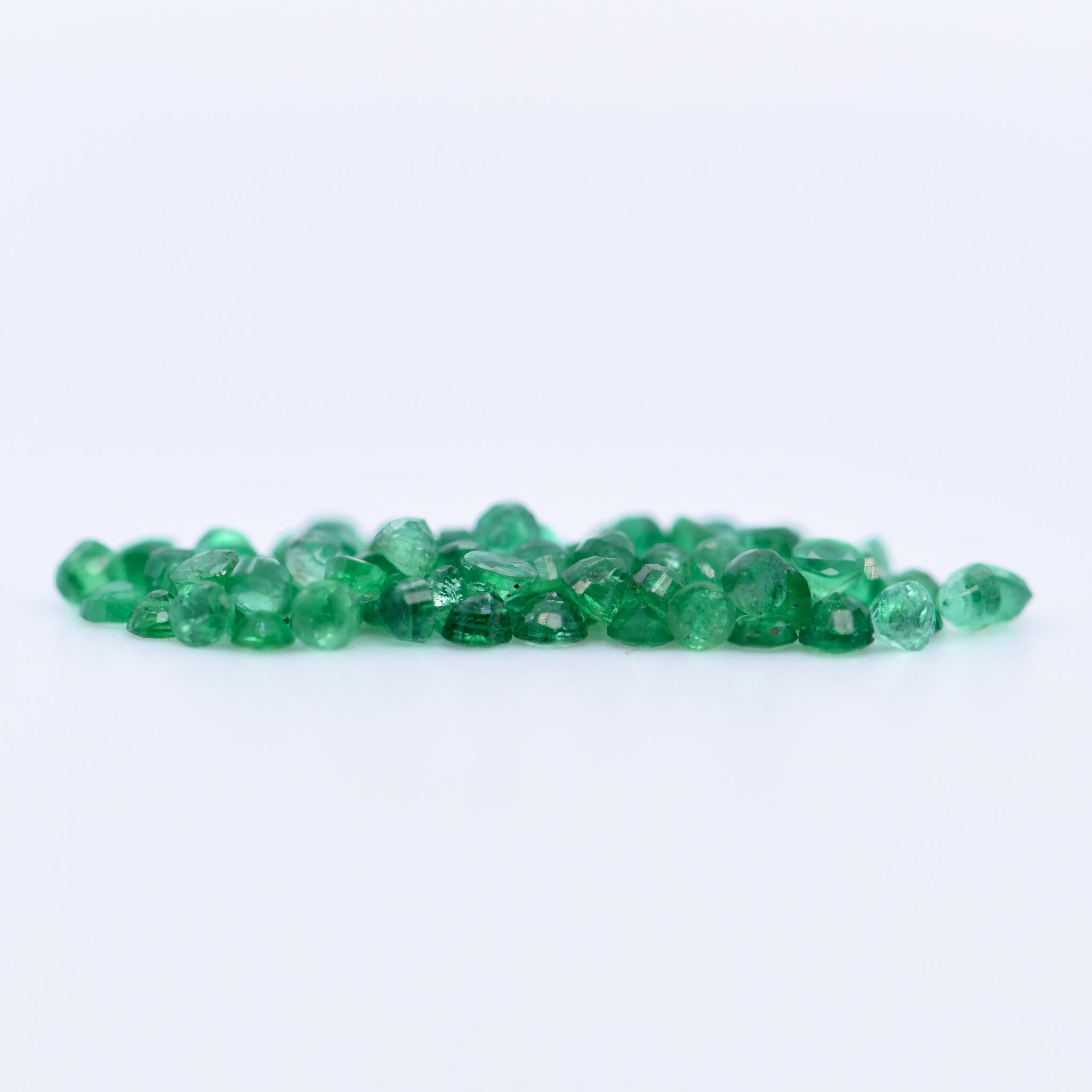 1.5mm Round Faceted Emeralds