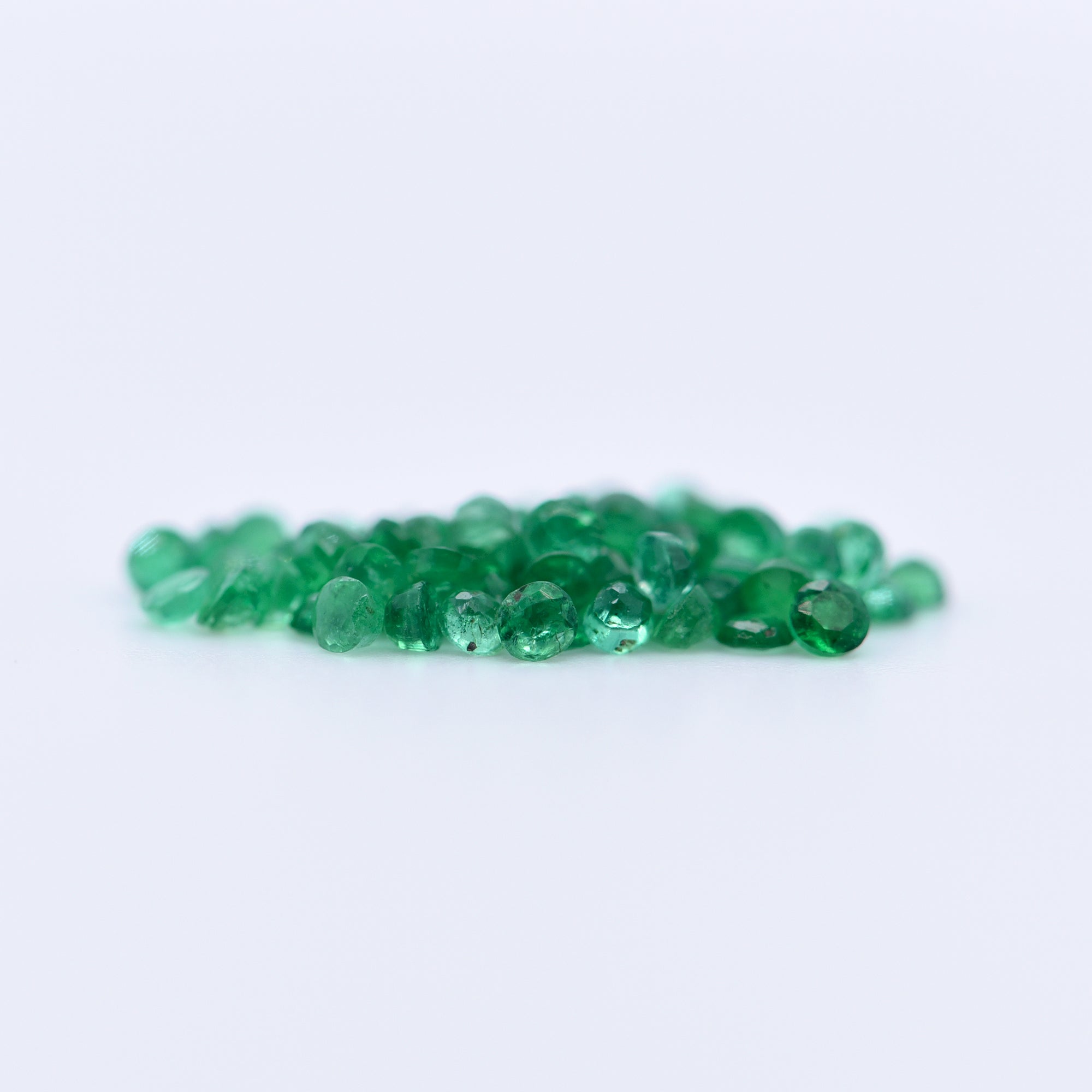 1.5mm Round Faceted Emeralds