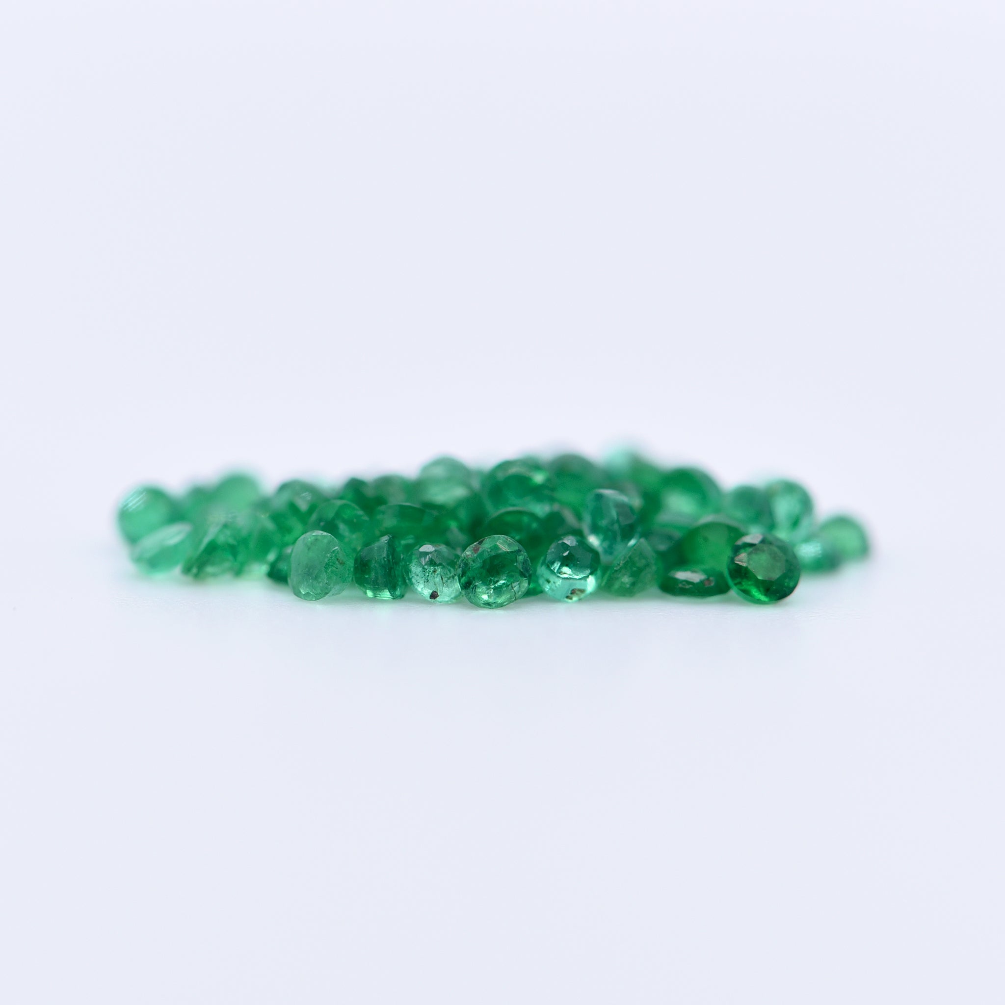 1.5mm Round Faceted Emeralds