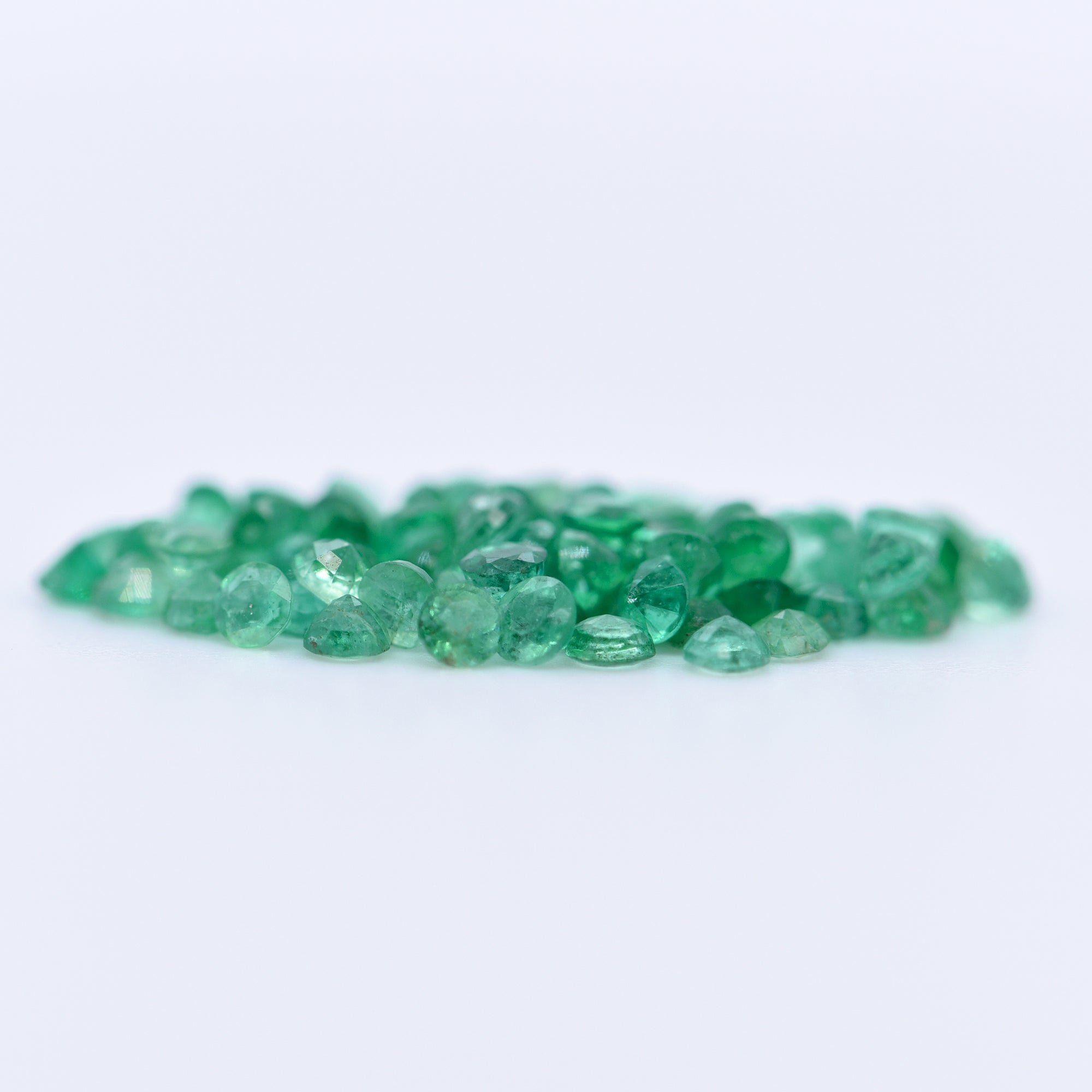 2mm Round Faceted Emeralds