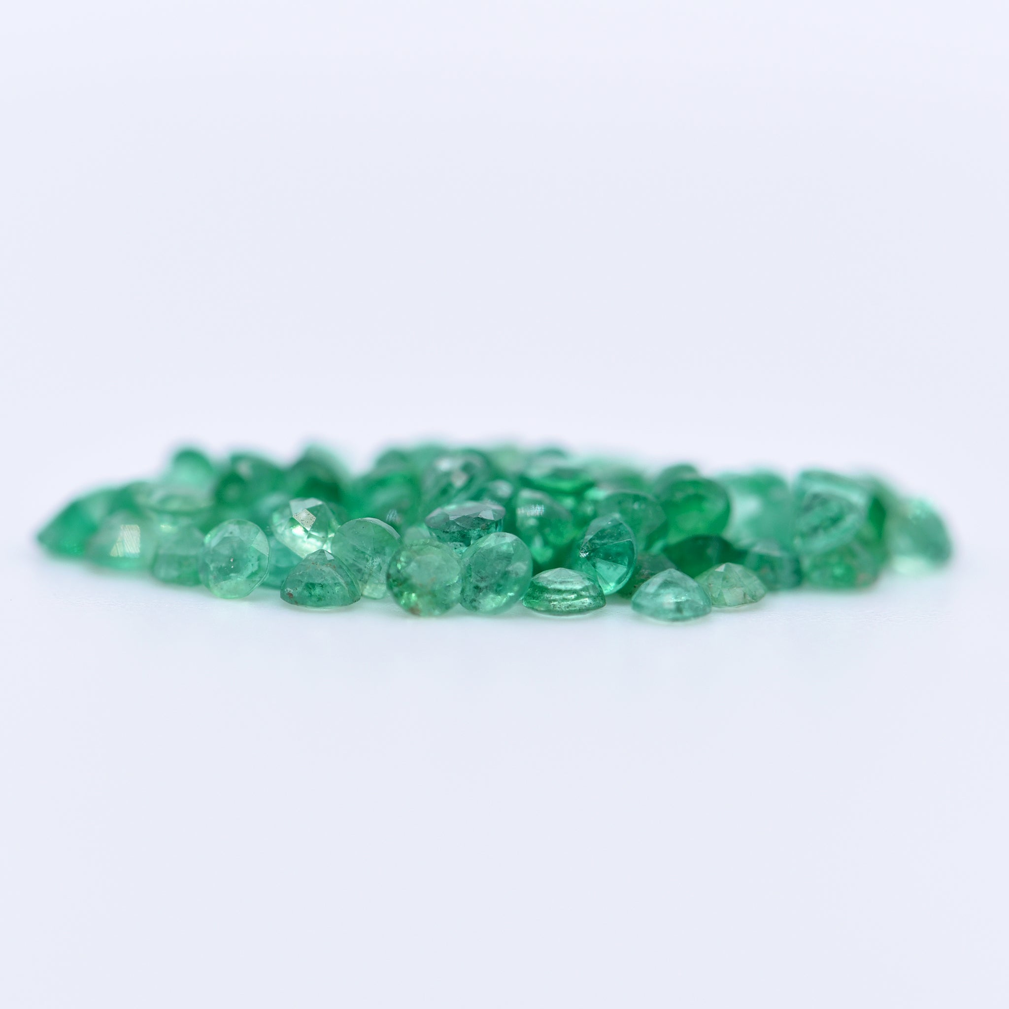 2mm Round Faceted Emeralds