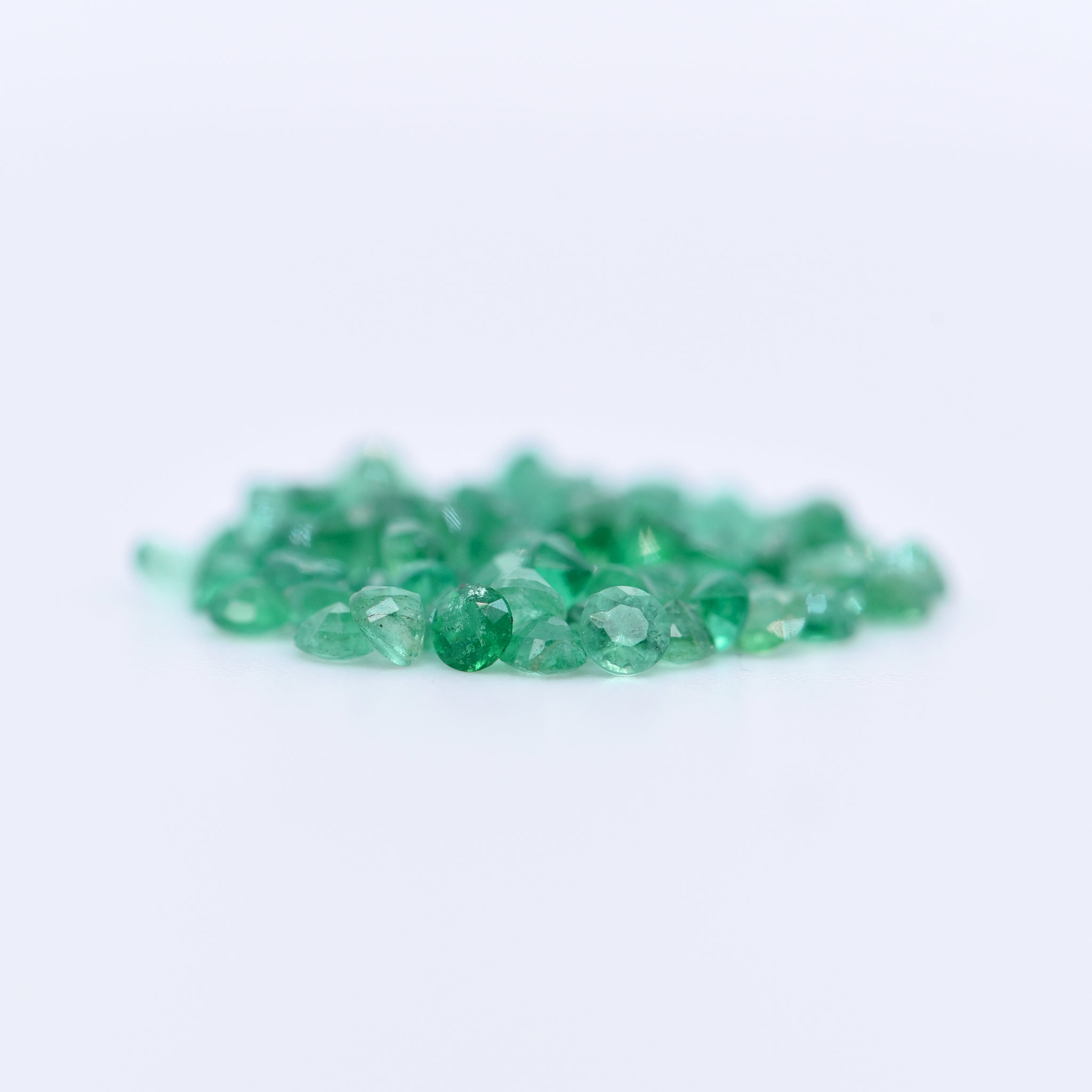 2mm Round Faceted Emeralds