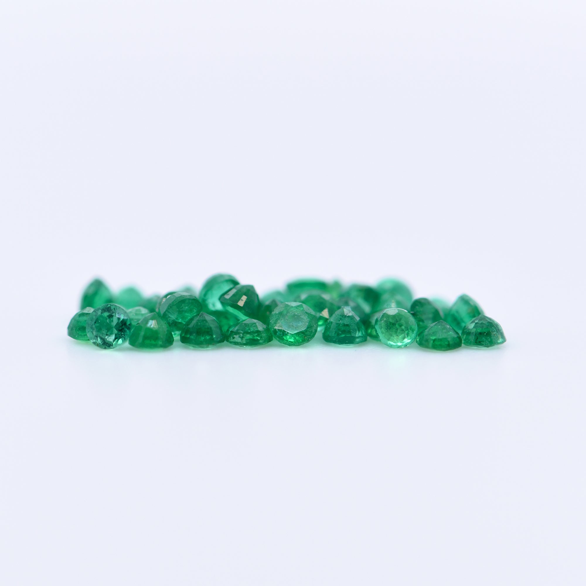 2mm Round Faceted Emeralds