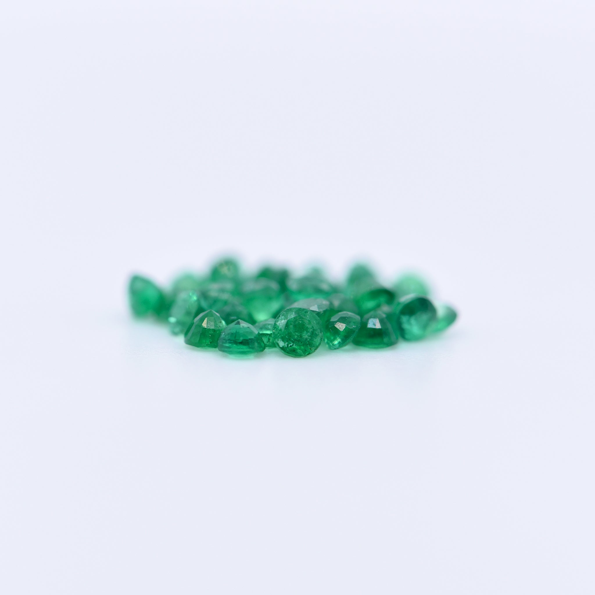 2mm Round Faceted Emeralds