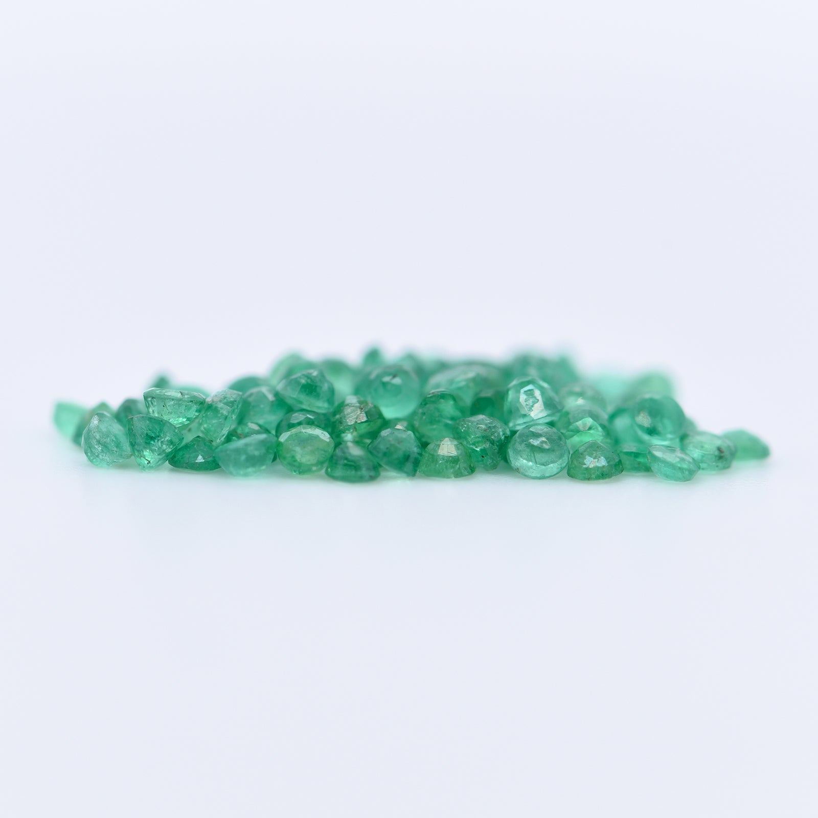 2mm Round Faceted Emeralds