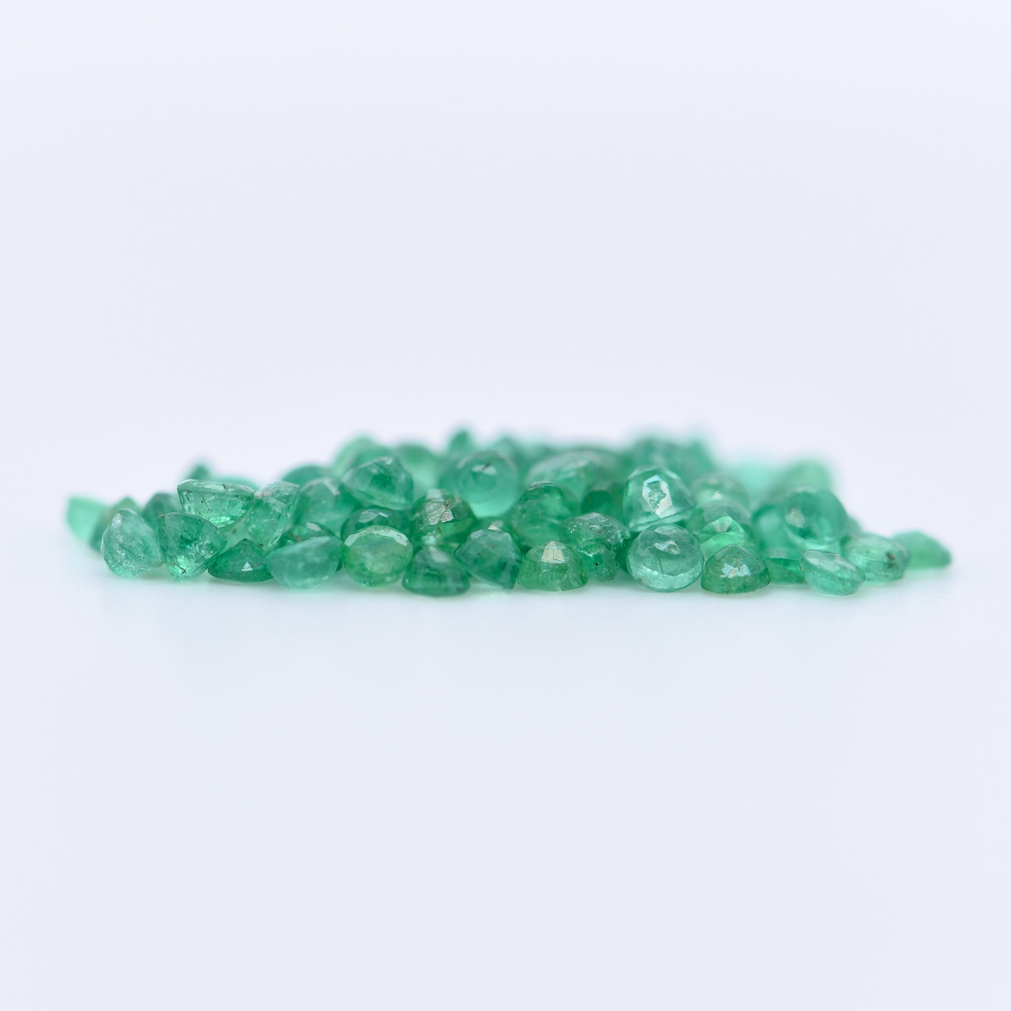 2mm Round Faceted Emeralds