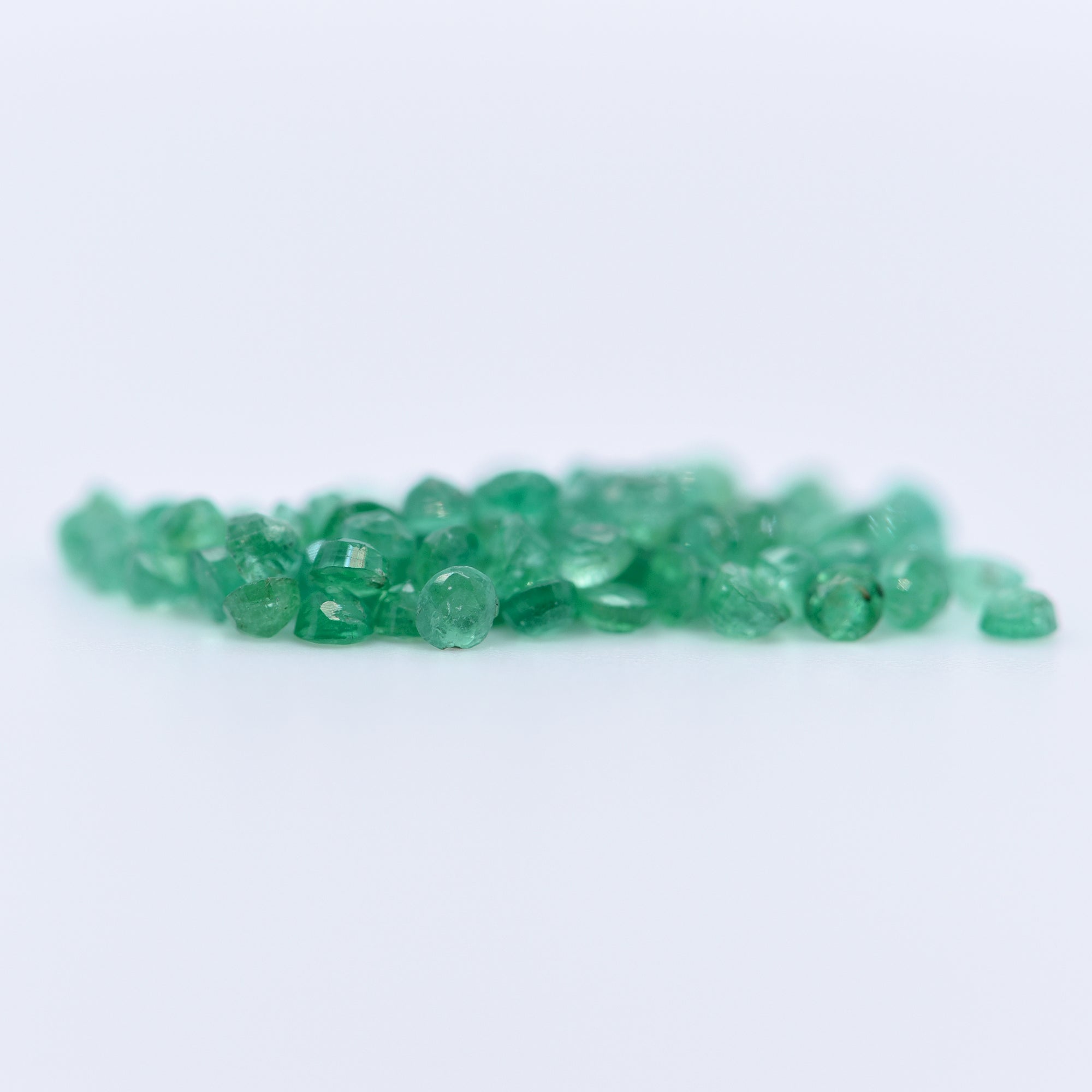 2mm Round Faceted Emeralds