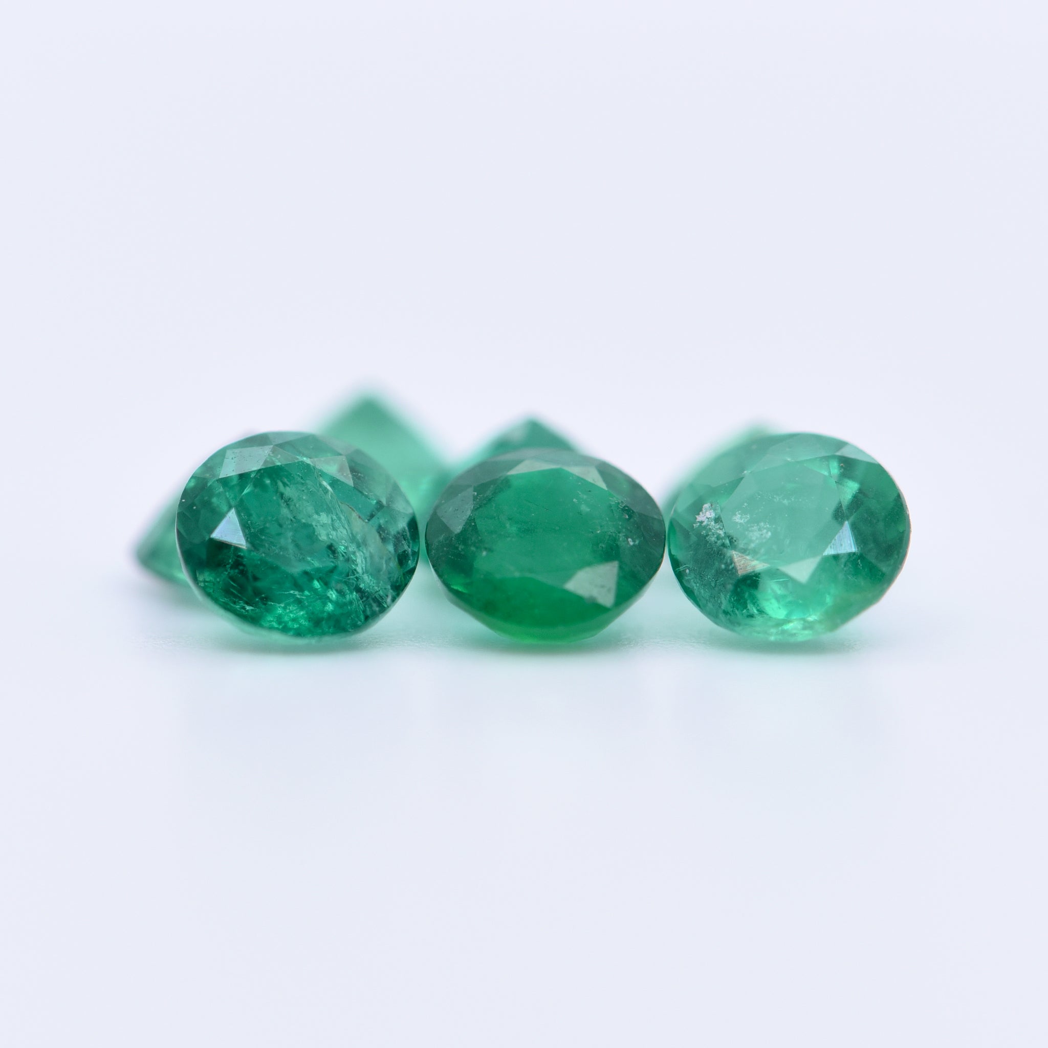 5mm Round Faceted Emeralds