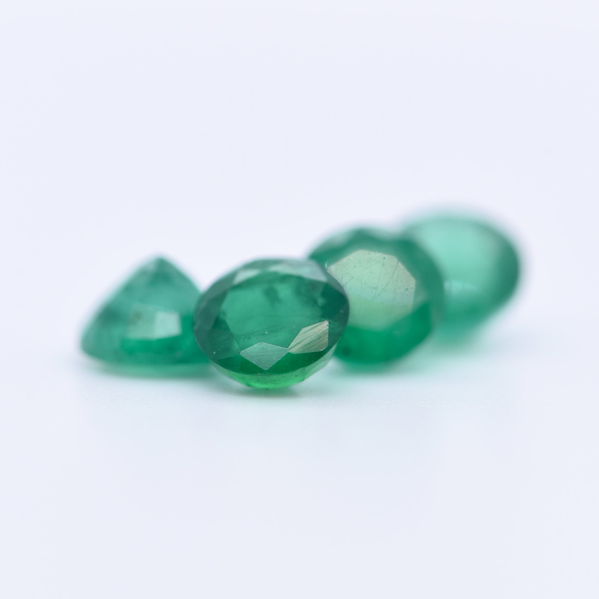 5.5mm Round Faceted Emeralds