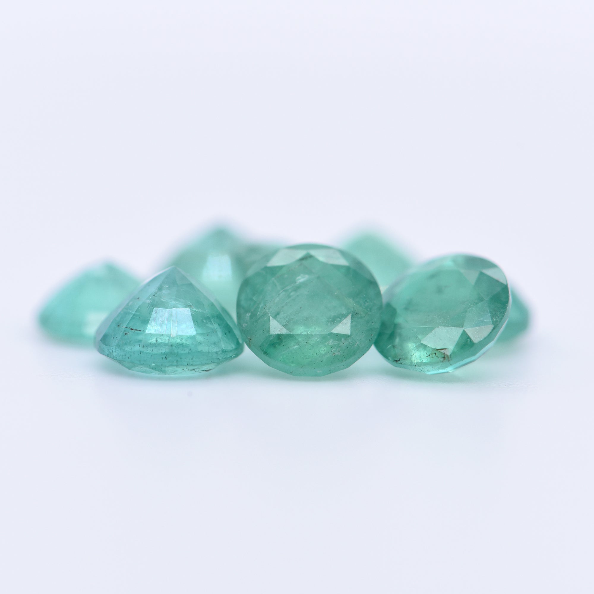 6mm Round Faceted Emeralds