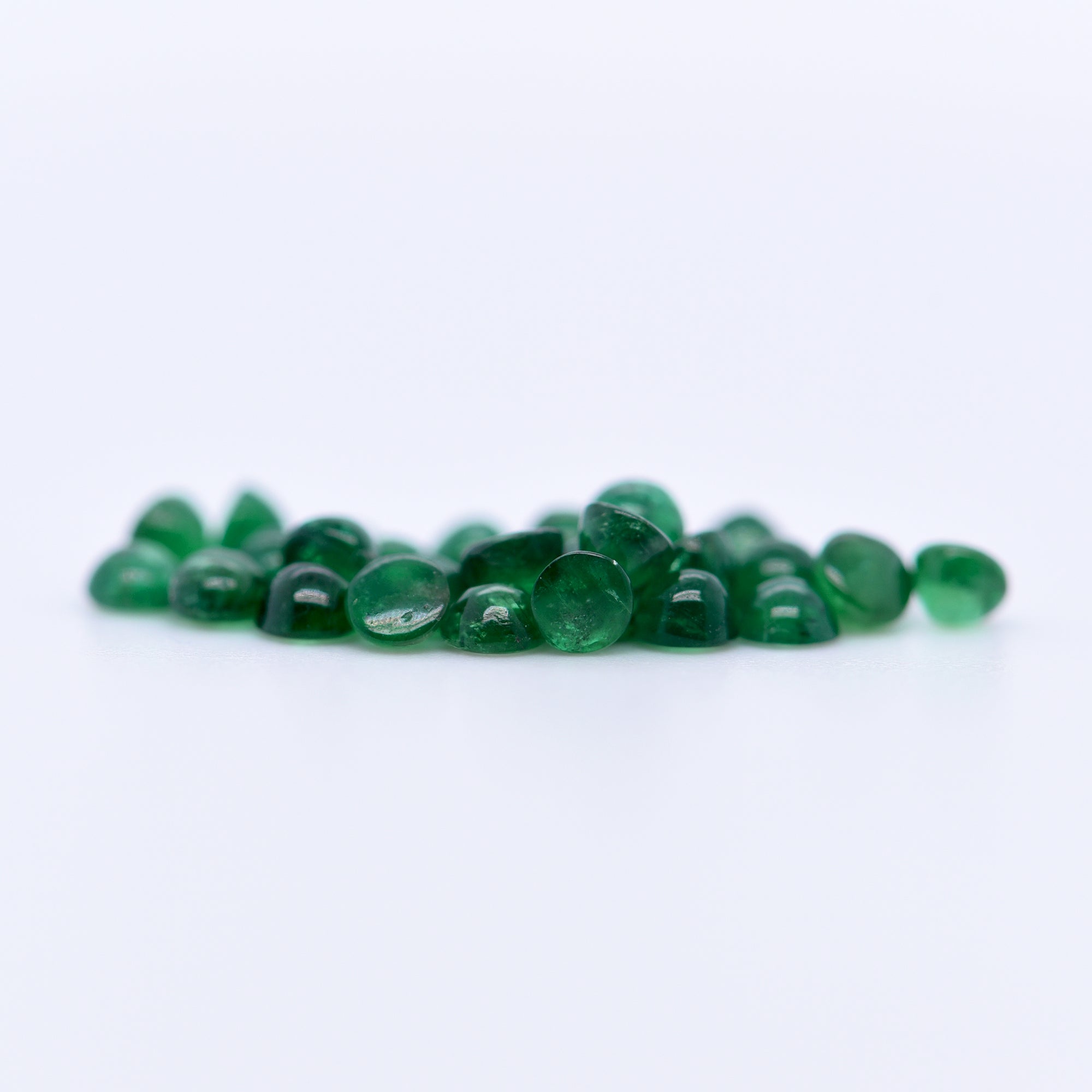 2.5mm Round Cabochon Emeralds