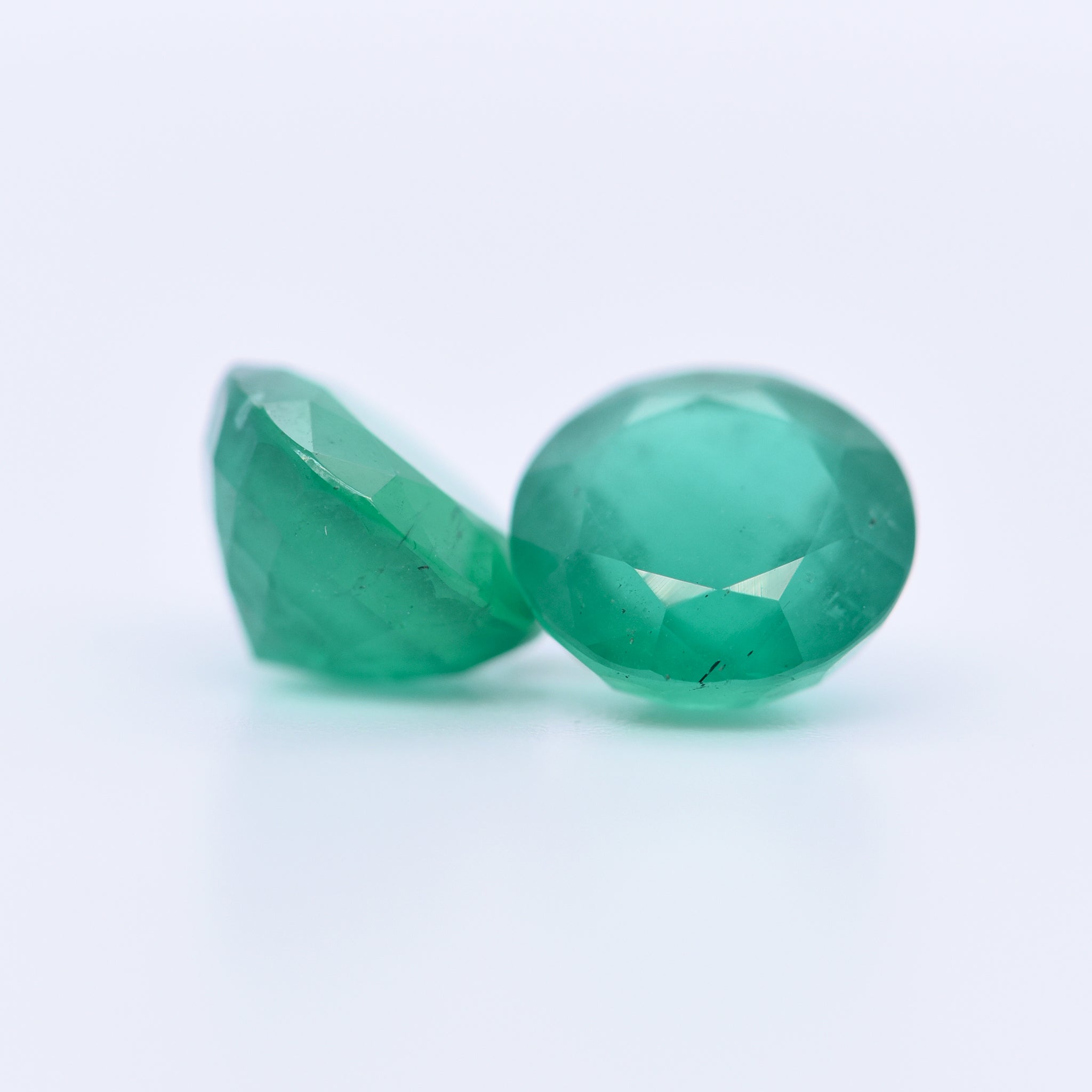 8mm Round Faceted Emeralds