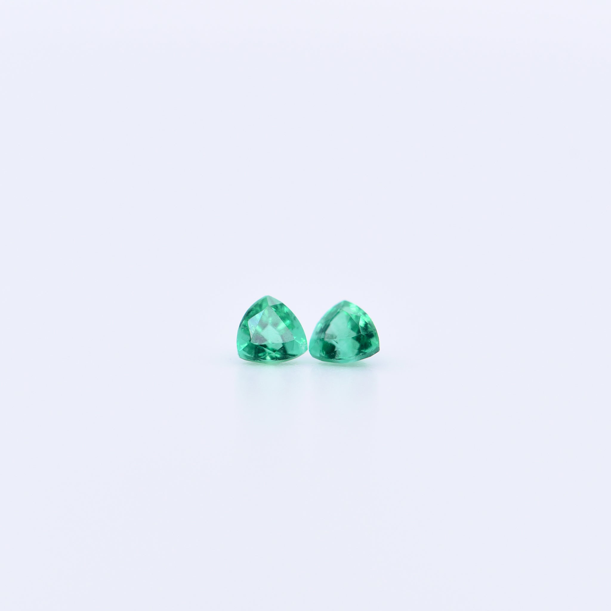 2.5x2.5 Trillion Faceted Emeralds