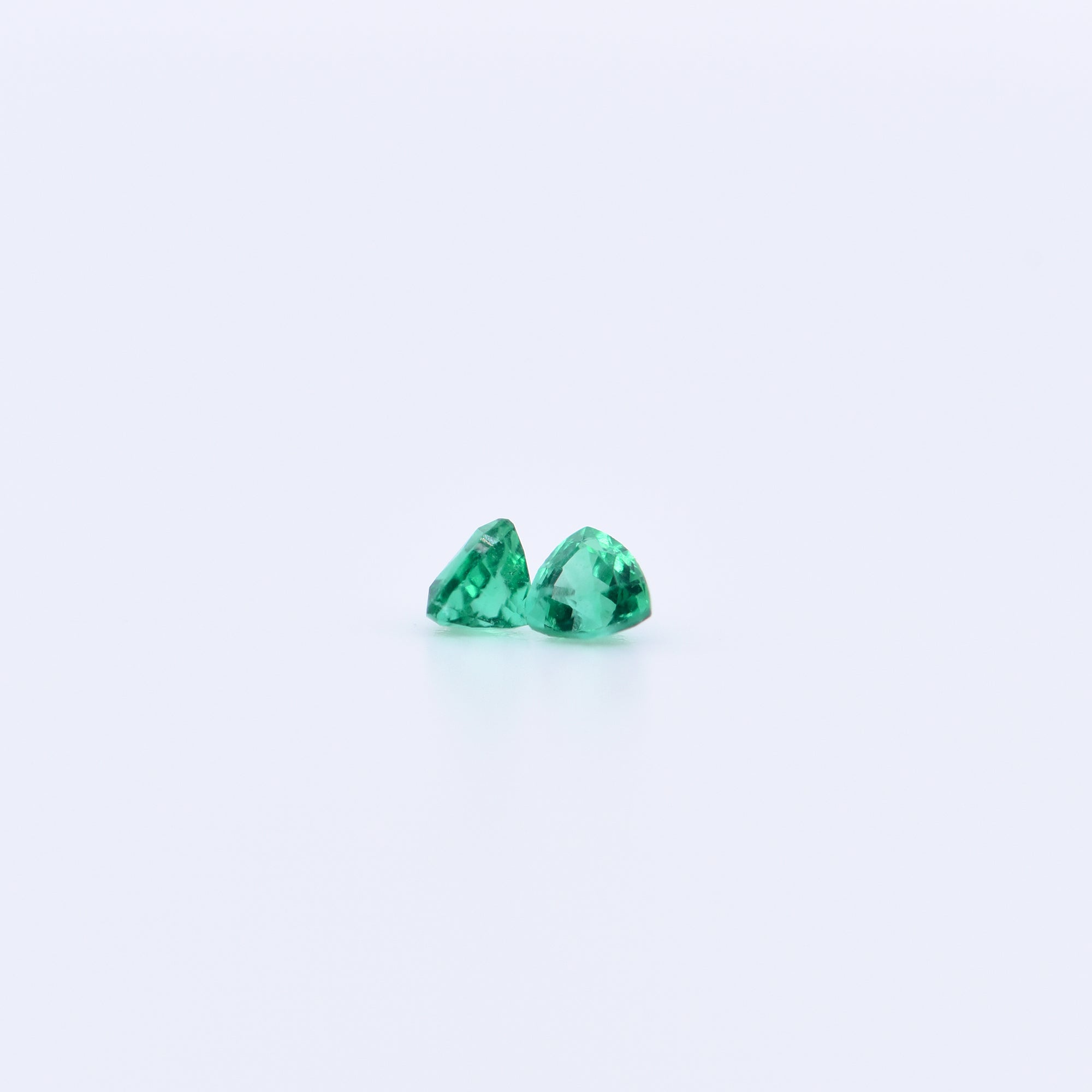 2.5x2.5 Trillion Faceted Emeralds