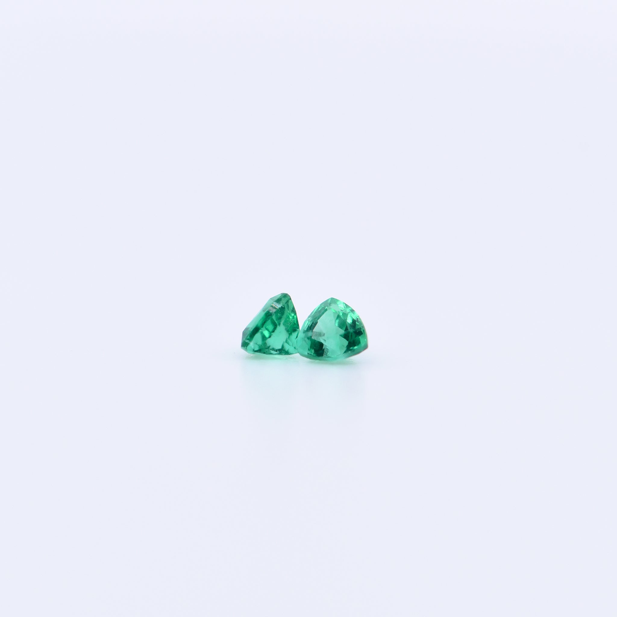 2.5x2.5 Trillion Faceted Emeralds