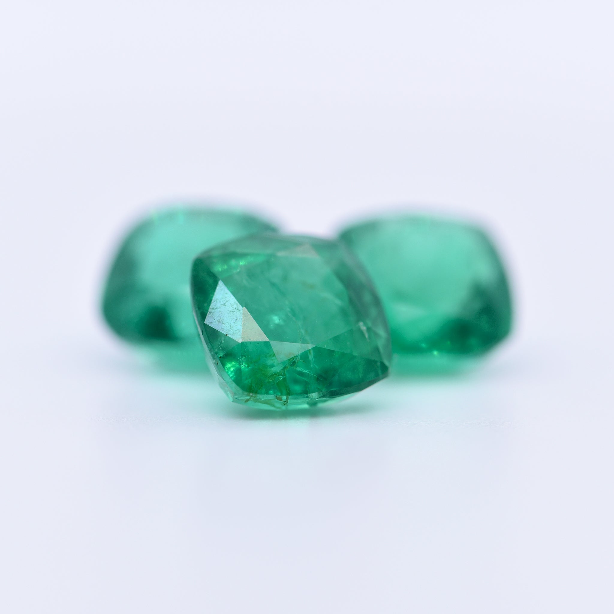 8x8 Cushion Faceted Emeralds