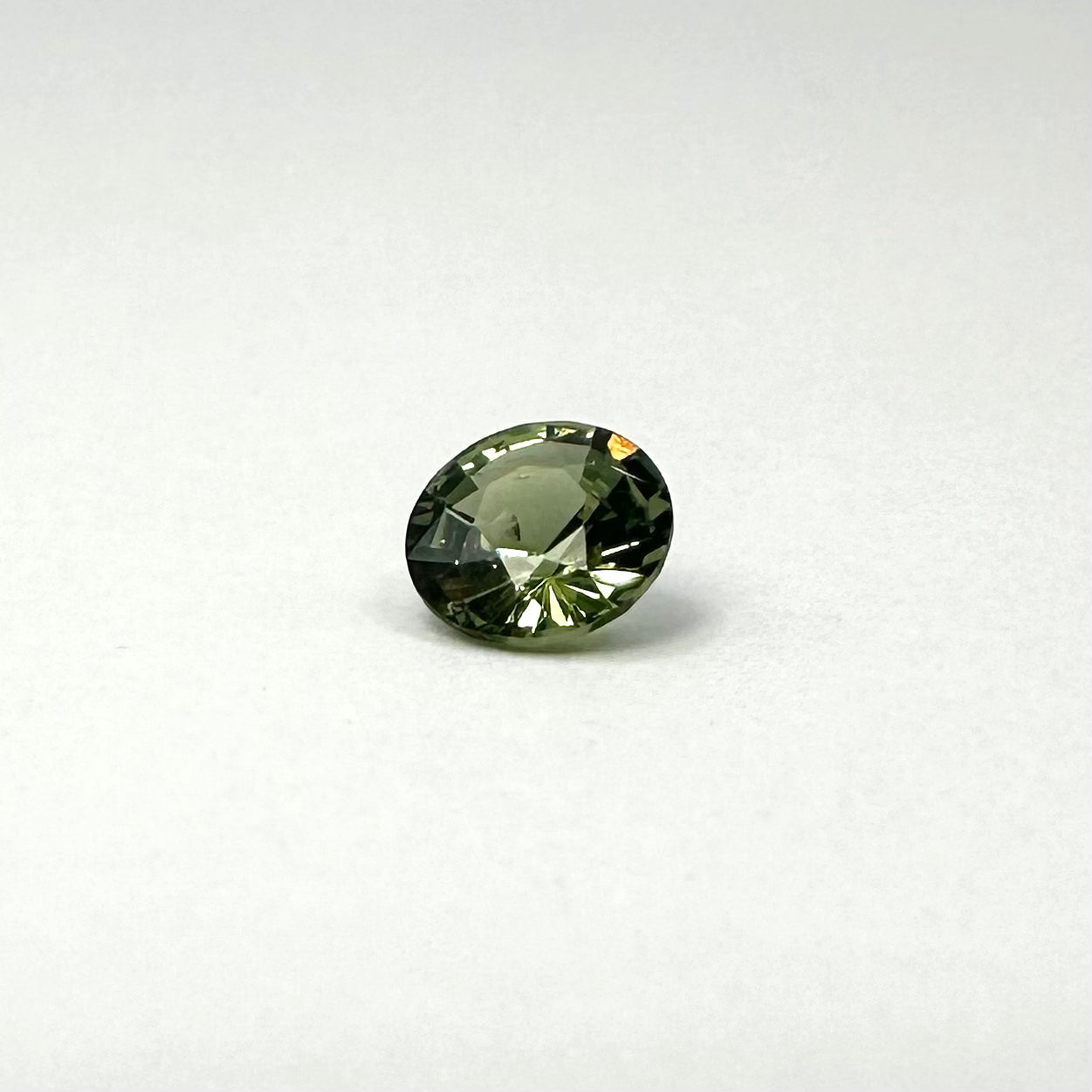 0.50ct 5mm Faceted Round Green Sapphire