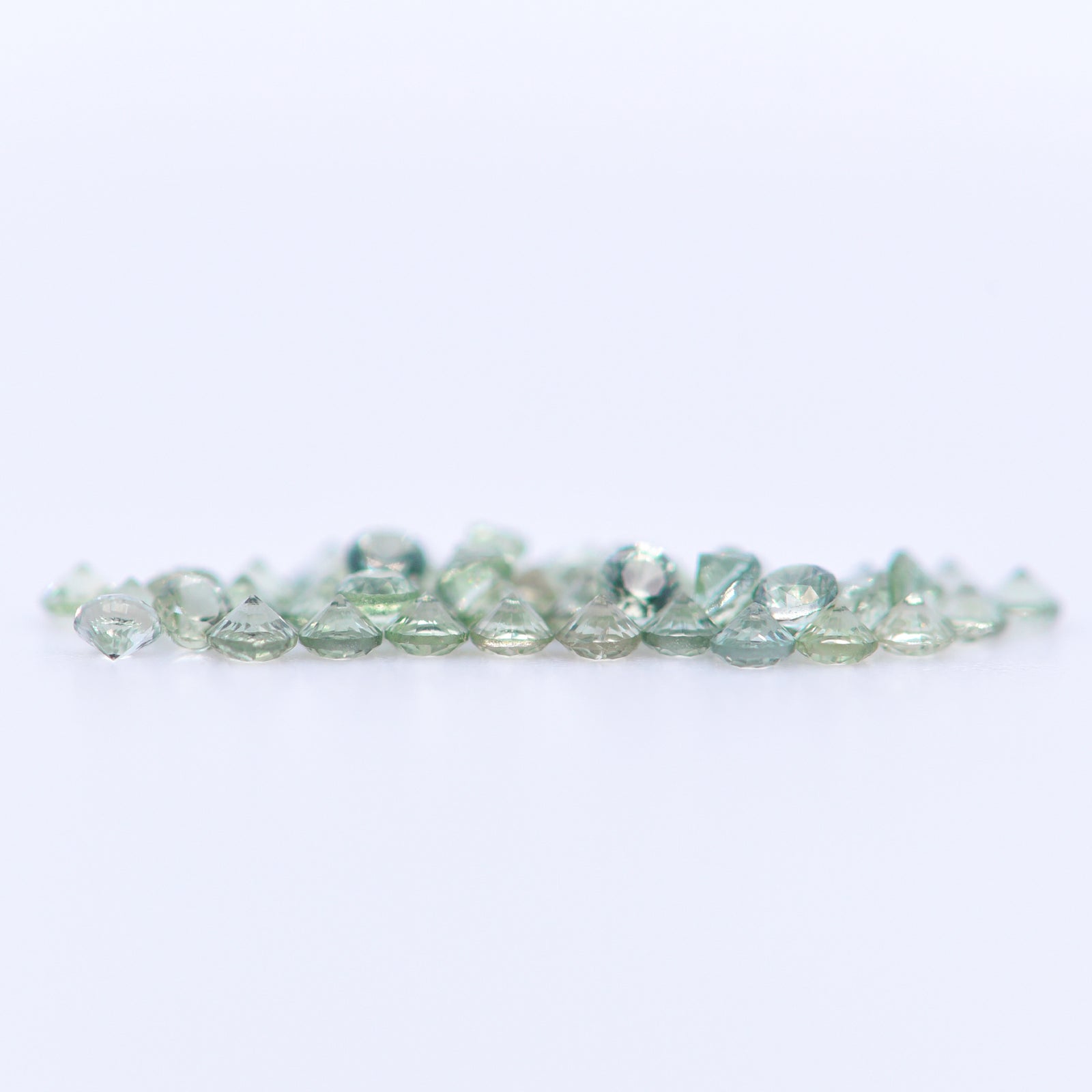 1.75mm Round Faceted Green Sapphires