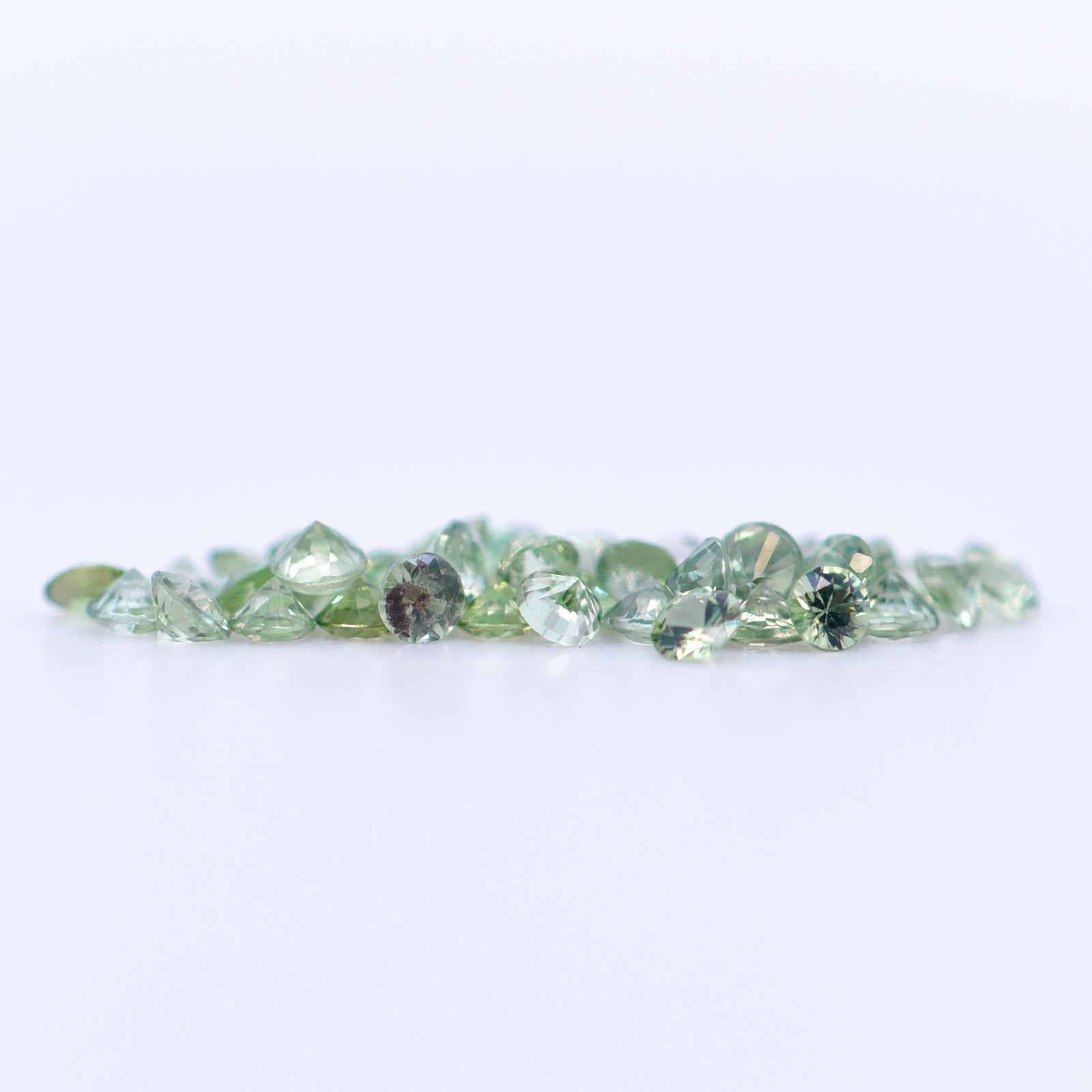 2mm Round Faceted Green Sapphires