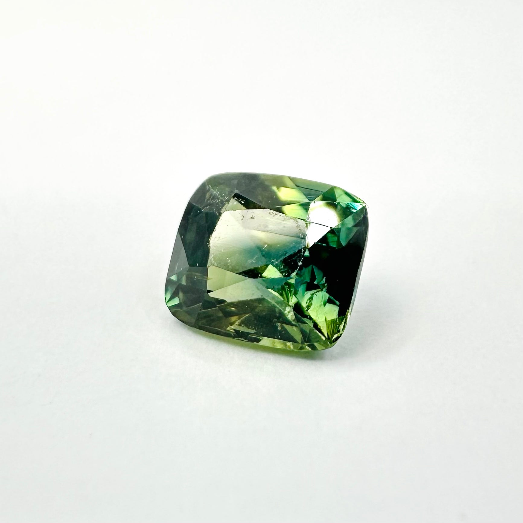1.07cts 5.8x5mm Cushion Shaped Faceted Green Sapphire