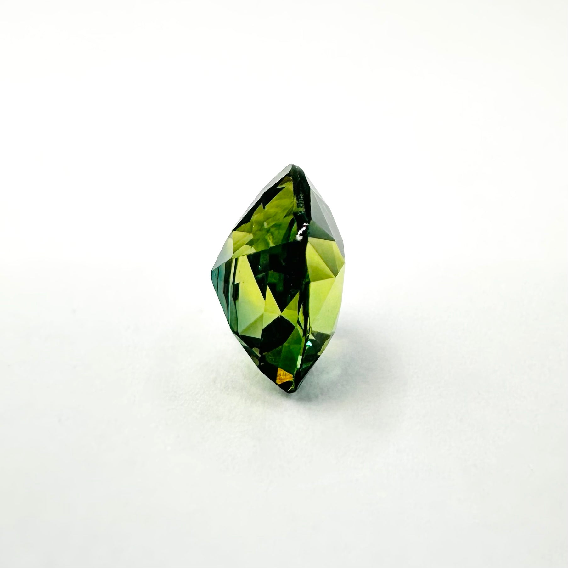 1.07cts 5.8x5mm Cushion Shaped Faceted Green Sapphire