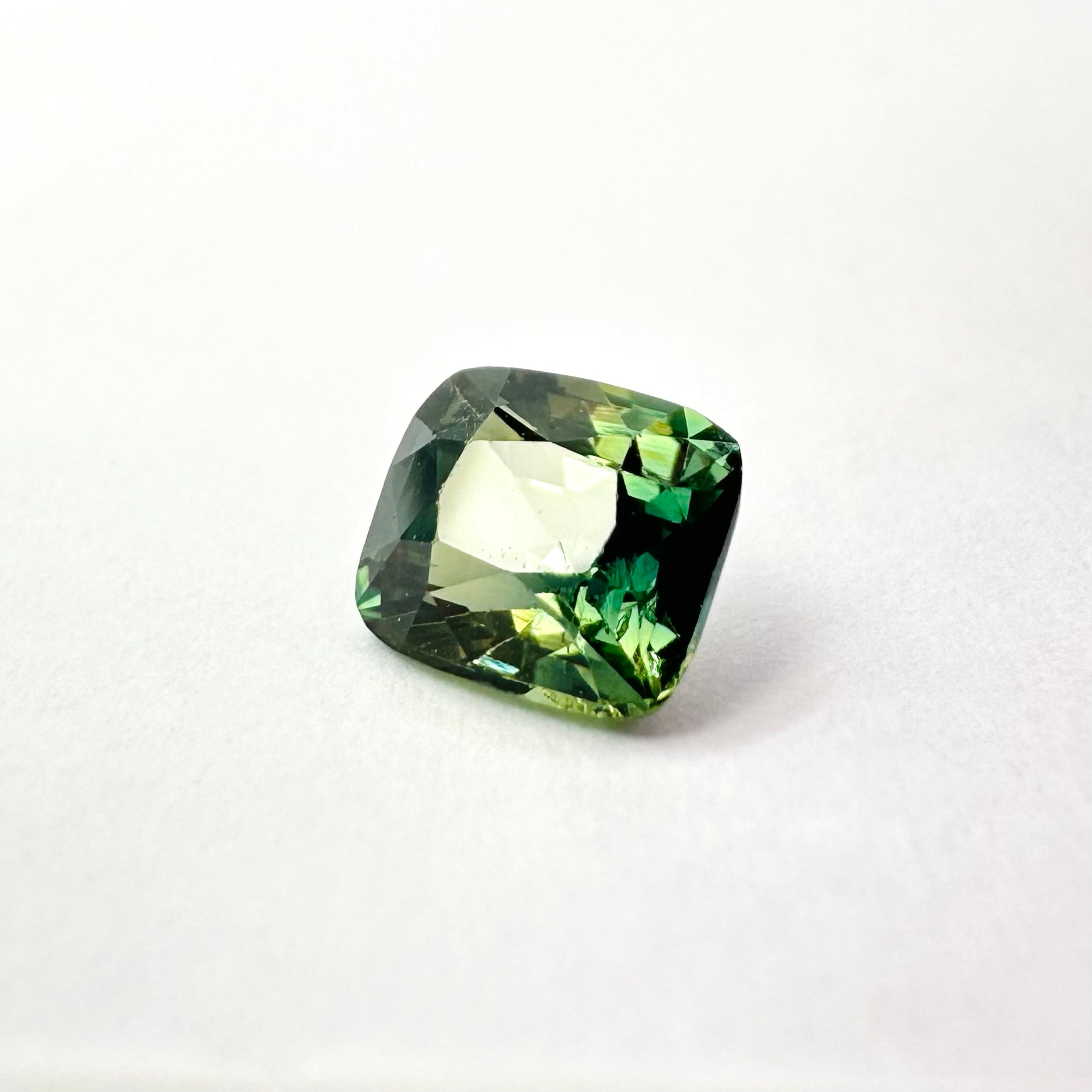 1.07cts 5.8x5mm Cushion Shaped Faceted Green Sapphire