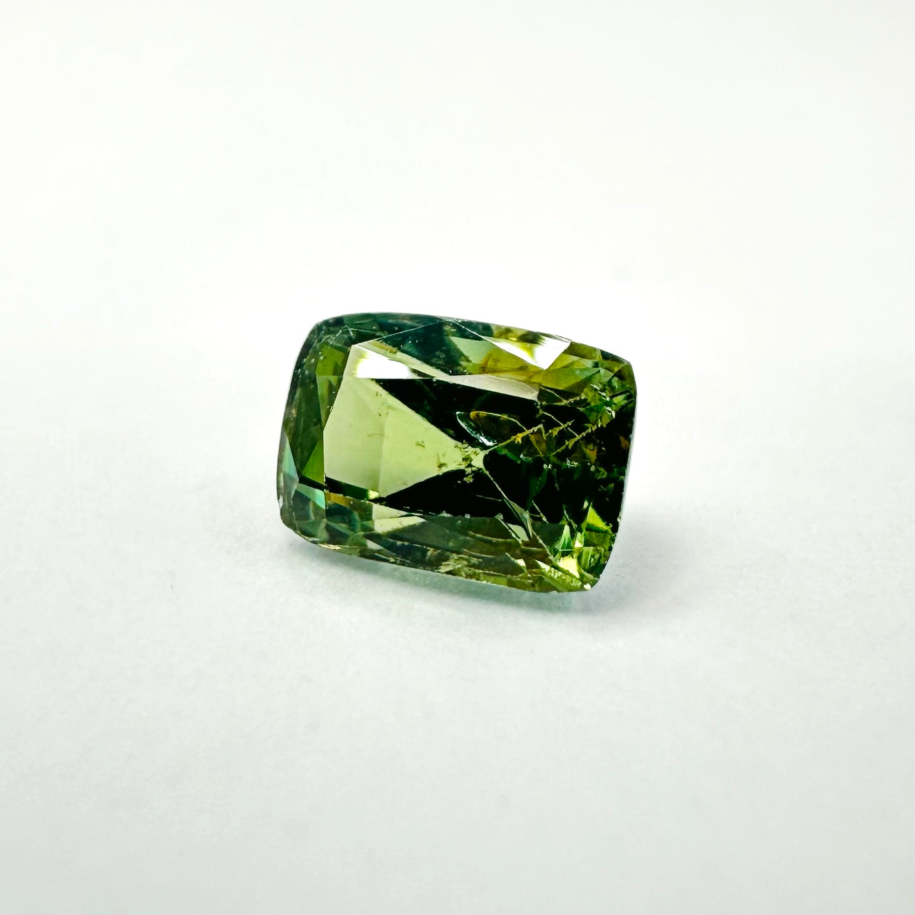 1.05cts 6x4.3mm Cushion Shaped Faceted Green Sapphire