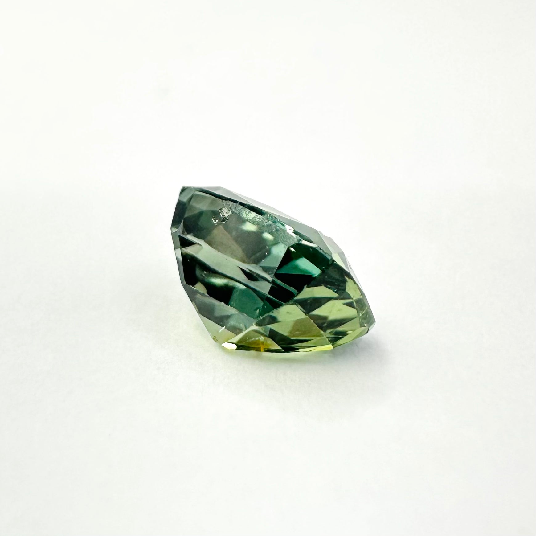 1.05cts 6x4.3mm Cushion Shaped Faceted Green Sapphire
