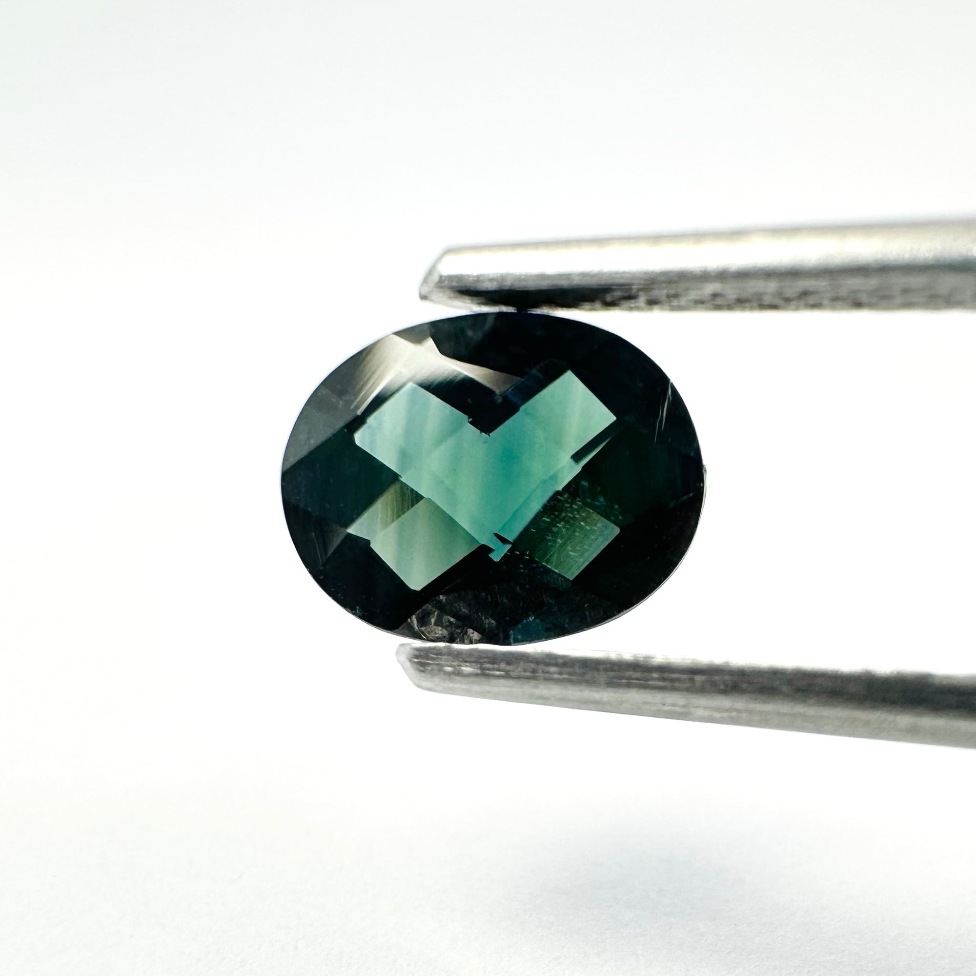 1.22cts 8x6mm Oval Checkerboard Cut Teal-Blue Sapphire