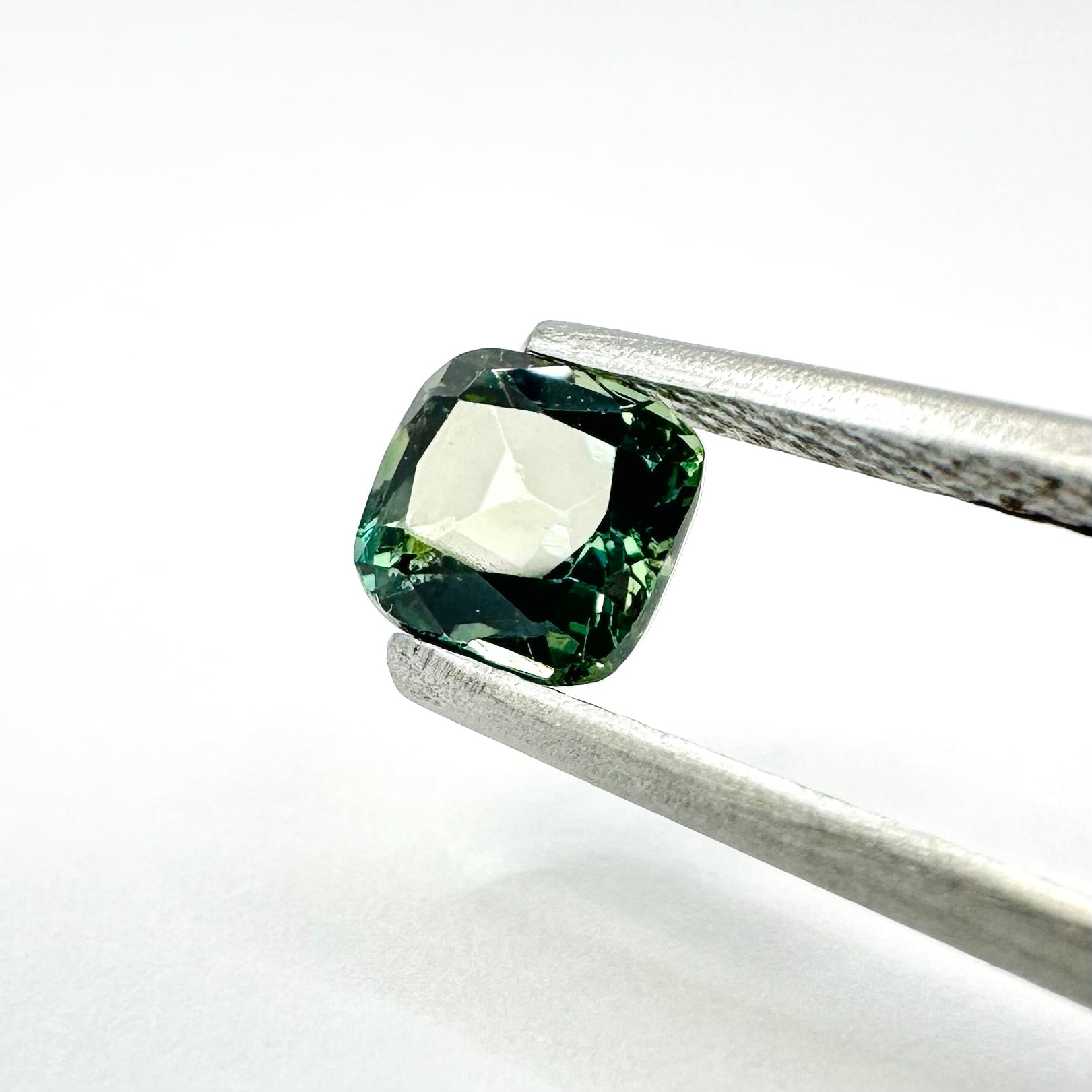 1.02cts 5.3x5.1mm Cushion Cut Faceted Teal Sapphire