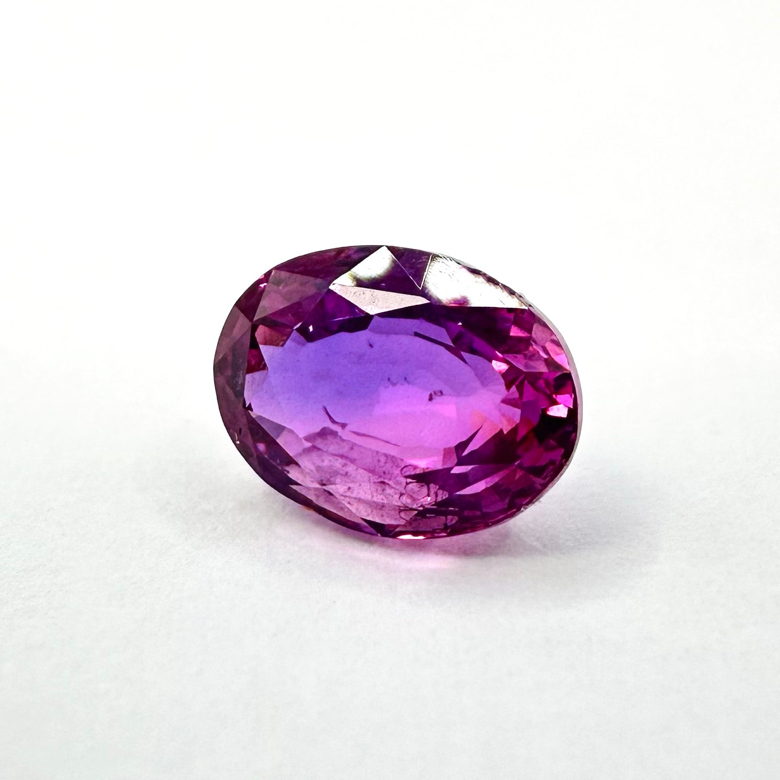 1.53cts 7.5x5.5mm Oval Faceted Pink-Purple Sapphire