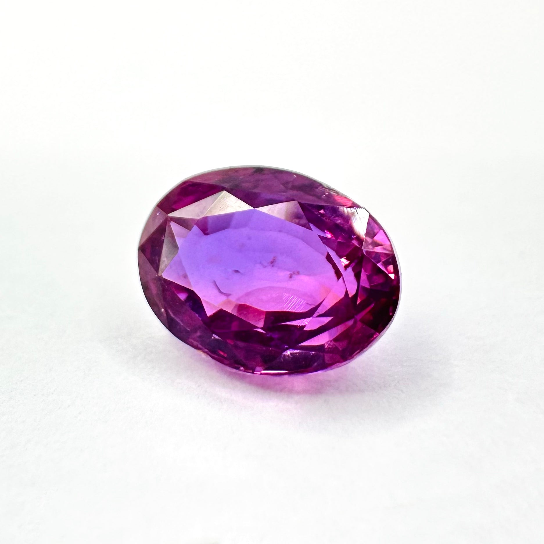1.53cts 7.5x5.5mm Oval Faceted Pink-Purple Sapphire
