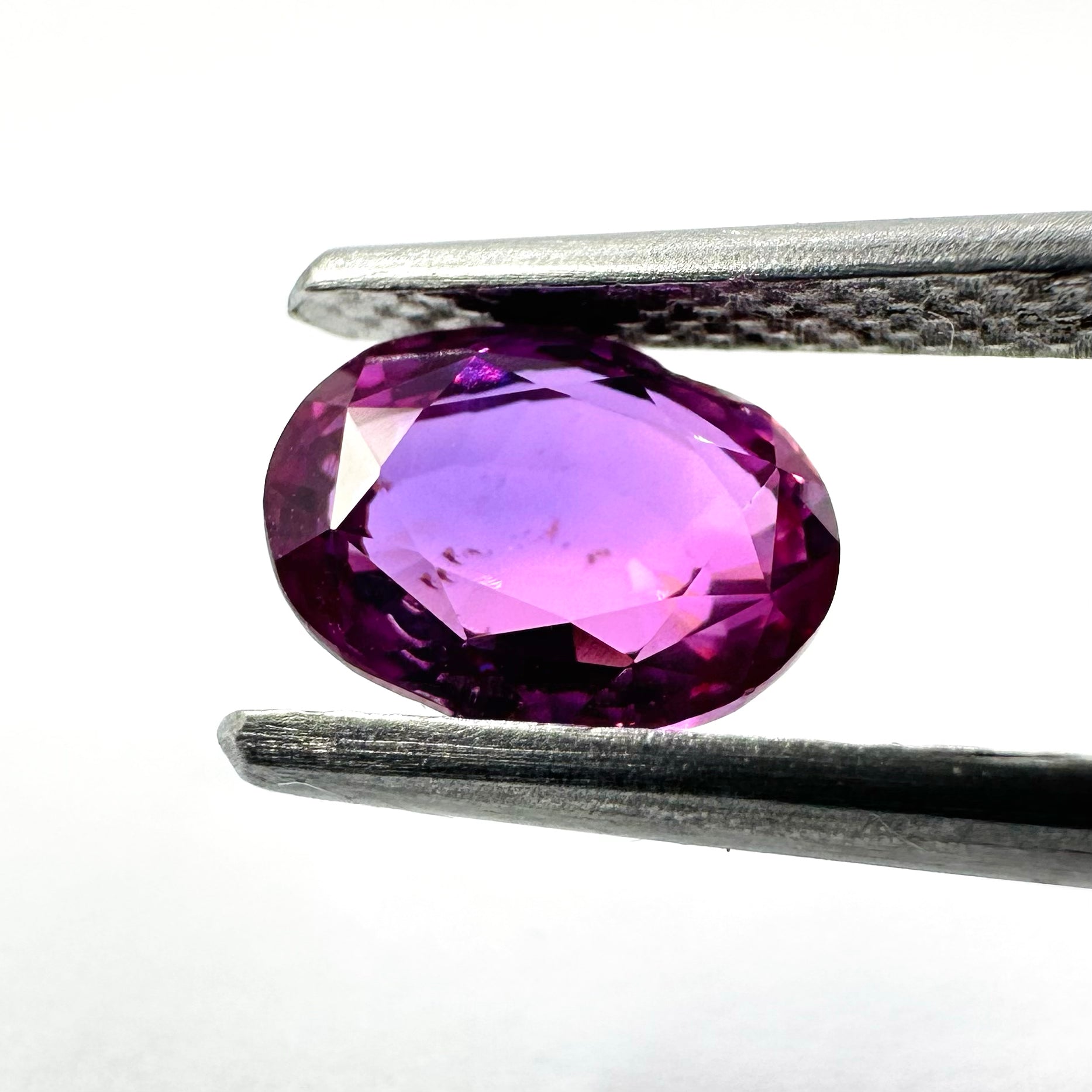 1.53cts 7.5x5.5mm Oval Faceted Pink-Purple Sapphire