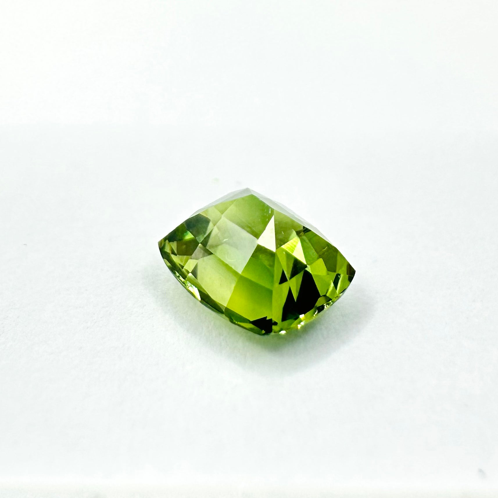 0.87cts 5.6x4.7mm Cushion Cut Faceted Green Sapphire