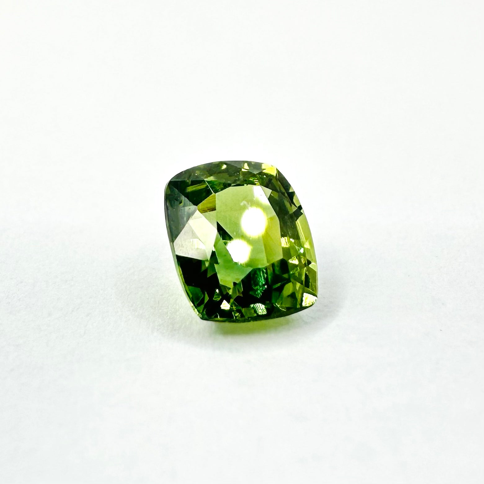 0.87cts 5.6x4.7mm Cushion Cut Faceted Green Sapphire